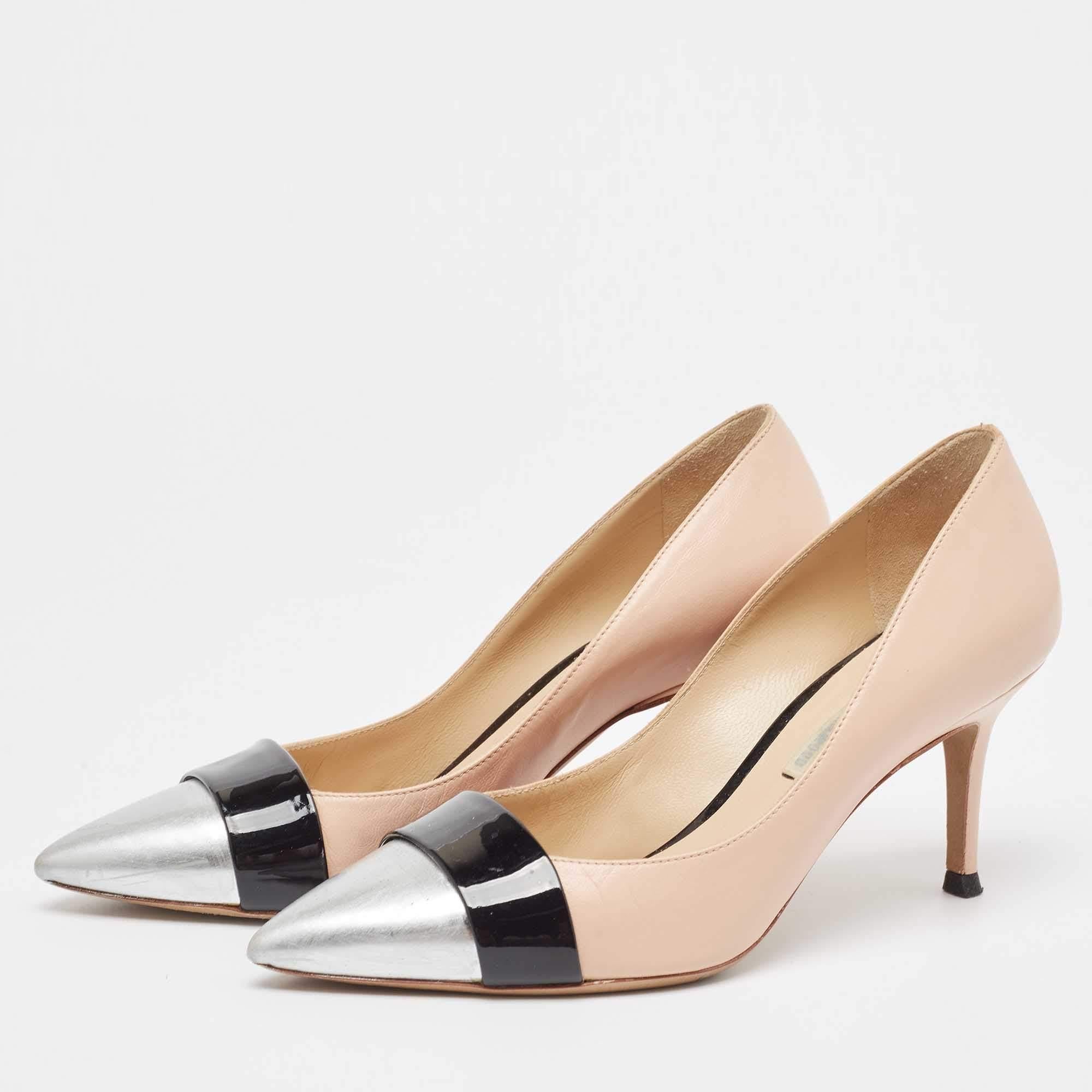 Exhibit an elegant style with this pair of pumps. These branded shoes for women are crafted from quality materials. They are set on durable soles and sleek heels.