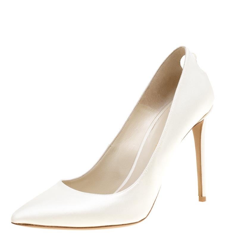 Crafted with satin and styled into a classic shape, this creation from Nicholas Kirkwood is a blend of luxury and elegance. They feature pointed toes, 10 cm heels and cutout counters with faux pearl detailing.

Includes: Packaging
