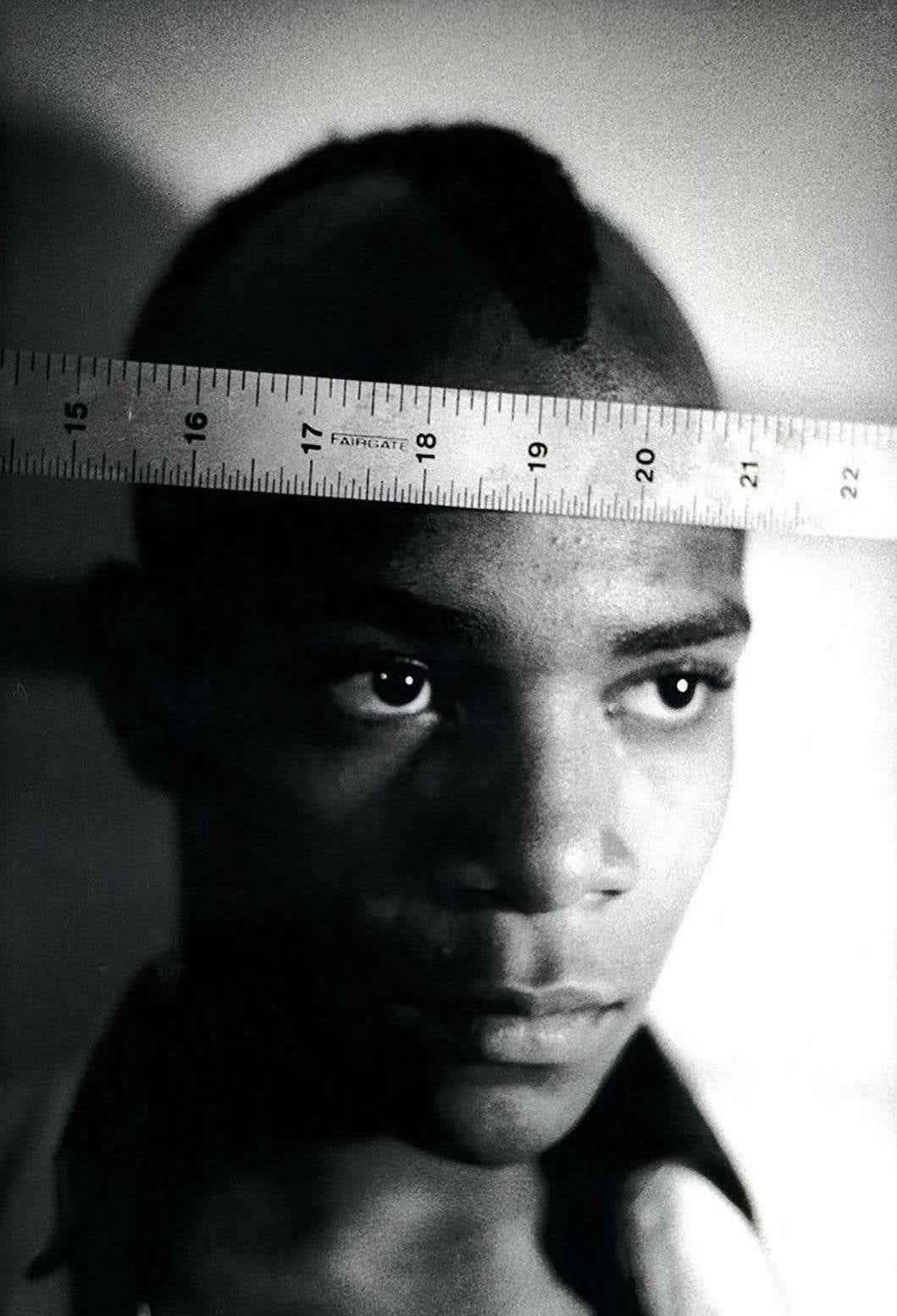 Basquiat 1979 photograph (Nick Taylor Jean-Michel Basquiat Gray) - Black Black and White Photograph by Nicholas Taylor