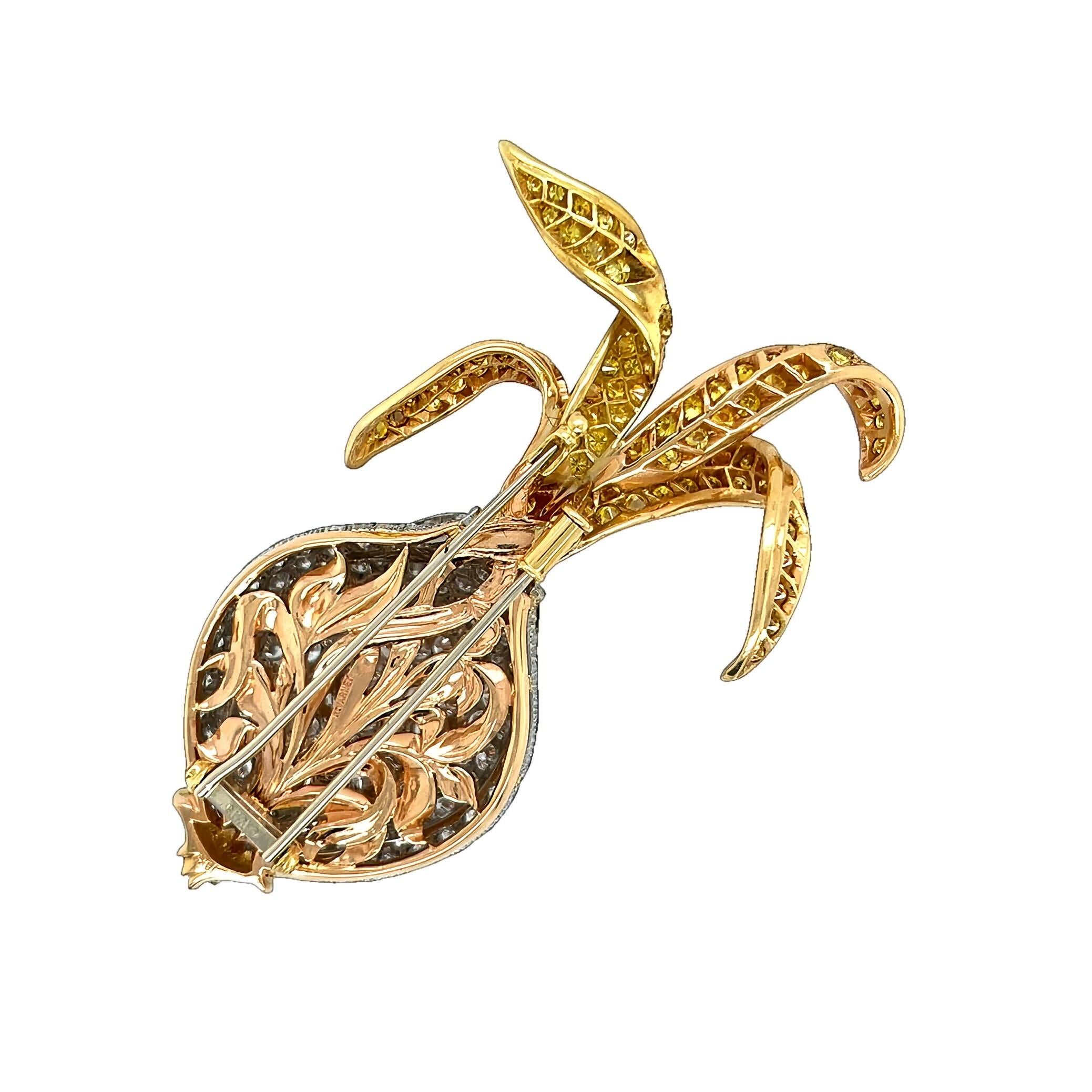 An 18 karat yellow, white and rose gold, yellow diamond and diamond brooch, Nicholas Varney, 1999.  Designed as a Peeling Onion, the bulb of white gold with yellow gold details set with approximately 148 round brilliant cut diamonds, the yellow gold