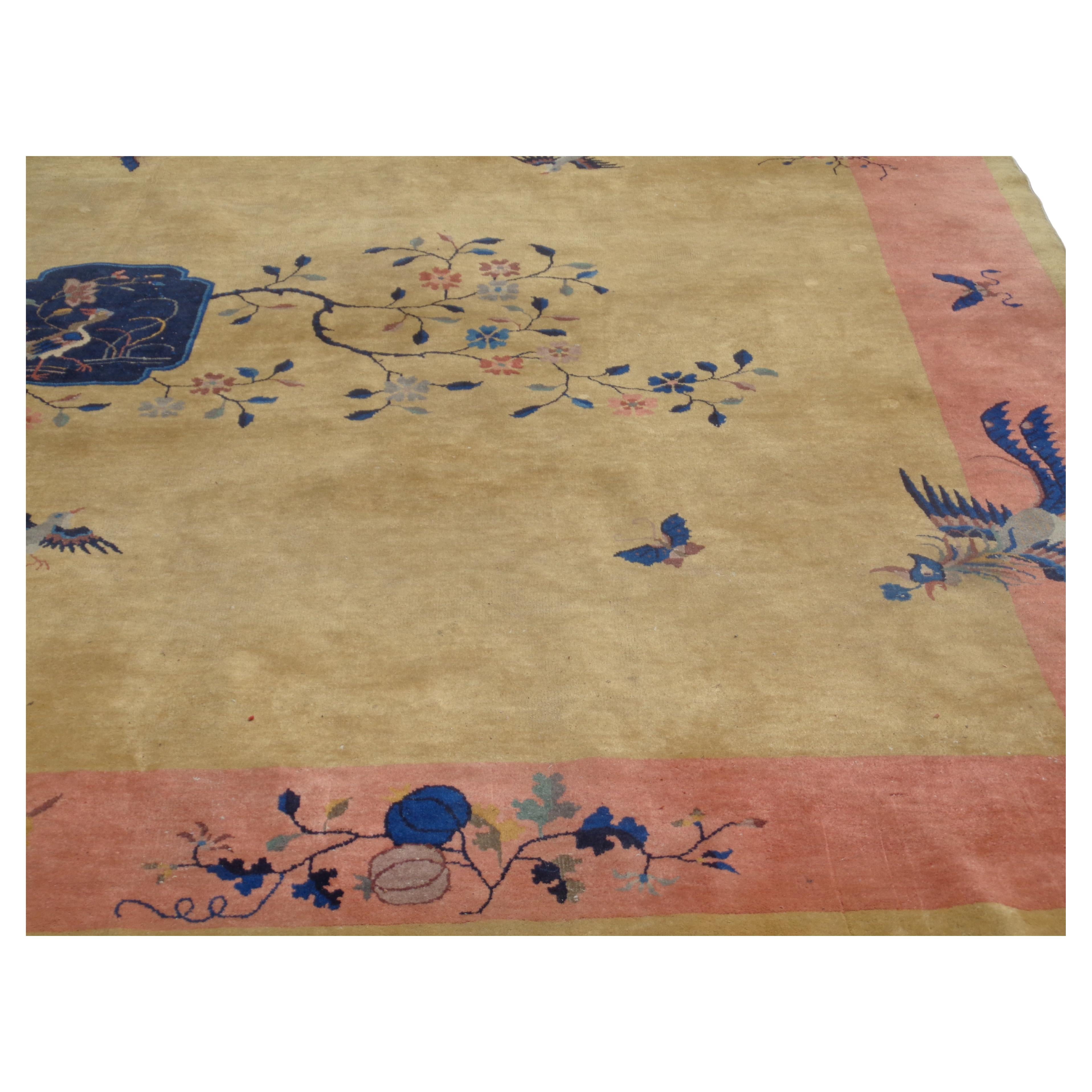 A Nichols Chinese Art Deco Oriental rug. Beautiful warm rich colors - gold, cobalt blue, light plum, peach, more. Finely drawn details - exotic birds, butterflies, floral vines, vases urns. Exceptionally pretty. Great size - 116