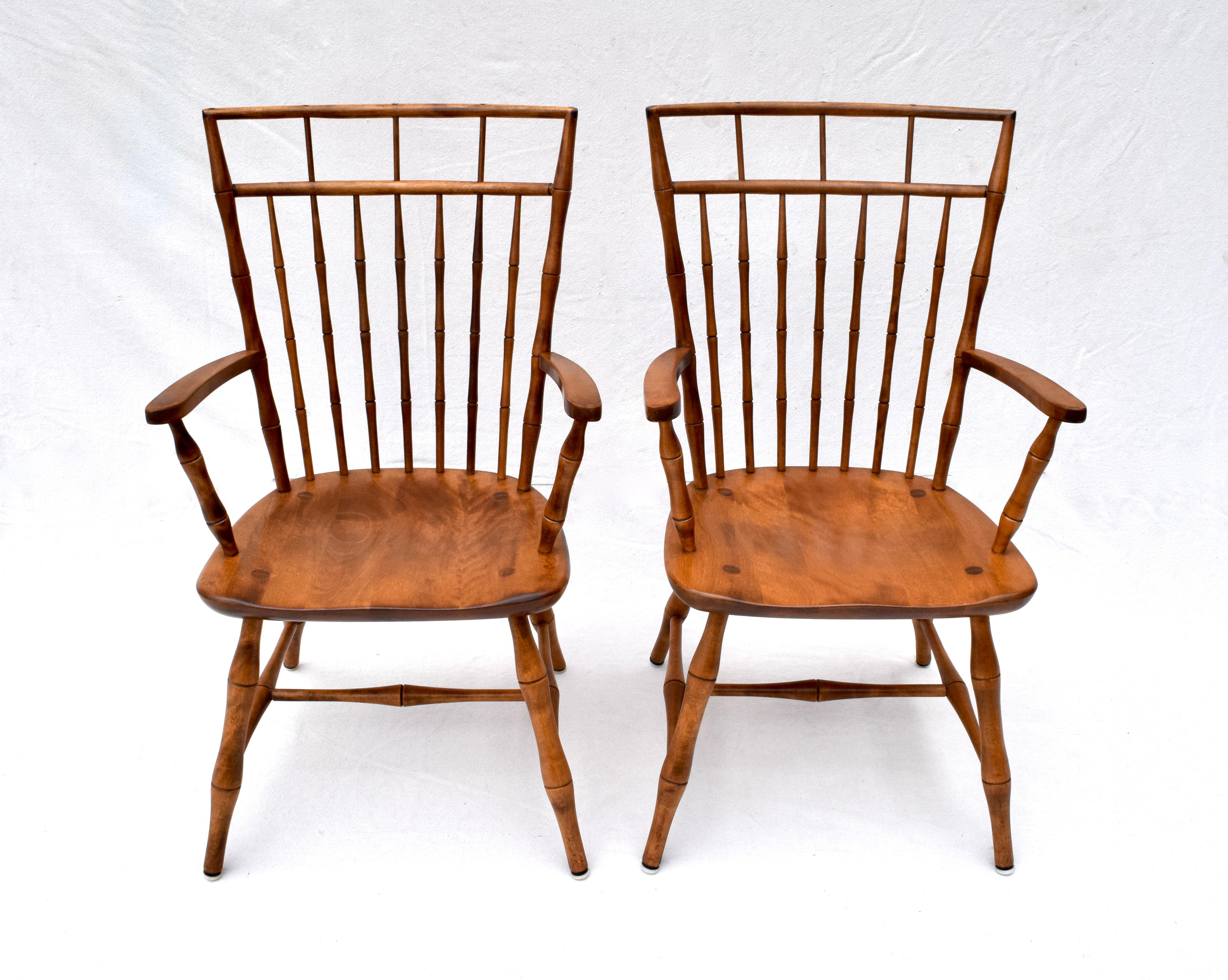 Set of six Nichols & Stone Birdcage Windsor dining chairs consisting of two arm chairs & four sides. Features split wedge mortise and tenon joinery in the seats & top of the crest rails with faux bamboo turned spindle legs & H stretchers