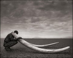 Ranger with Tusks of Killed Elephant, Amboseli – Nick Brandt, Elephant, Africa