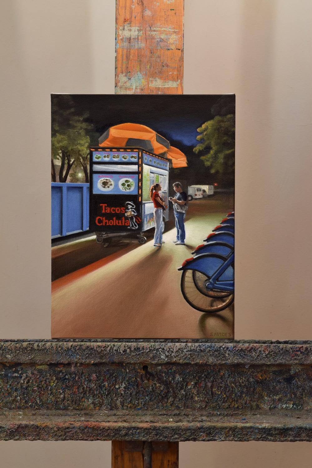 <p>Artist Comments<br>A couple stands outside a taco truck, inspired by a September evening on East 2nd Street in the East Village. Artist Nick Savides was drawn to their interaction, the way the trees were lit up by the night lights, and the long