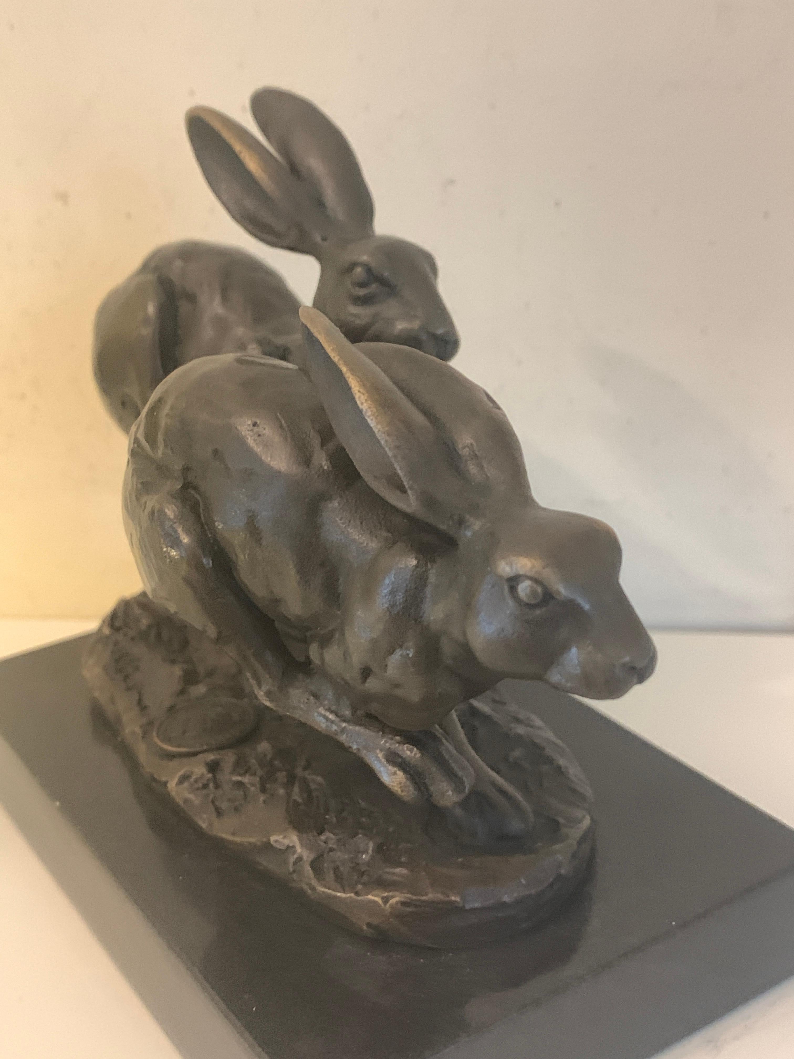 20th century French Bronze of two Hares Running, signed Nick with Paris seal 1