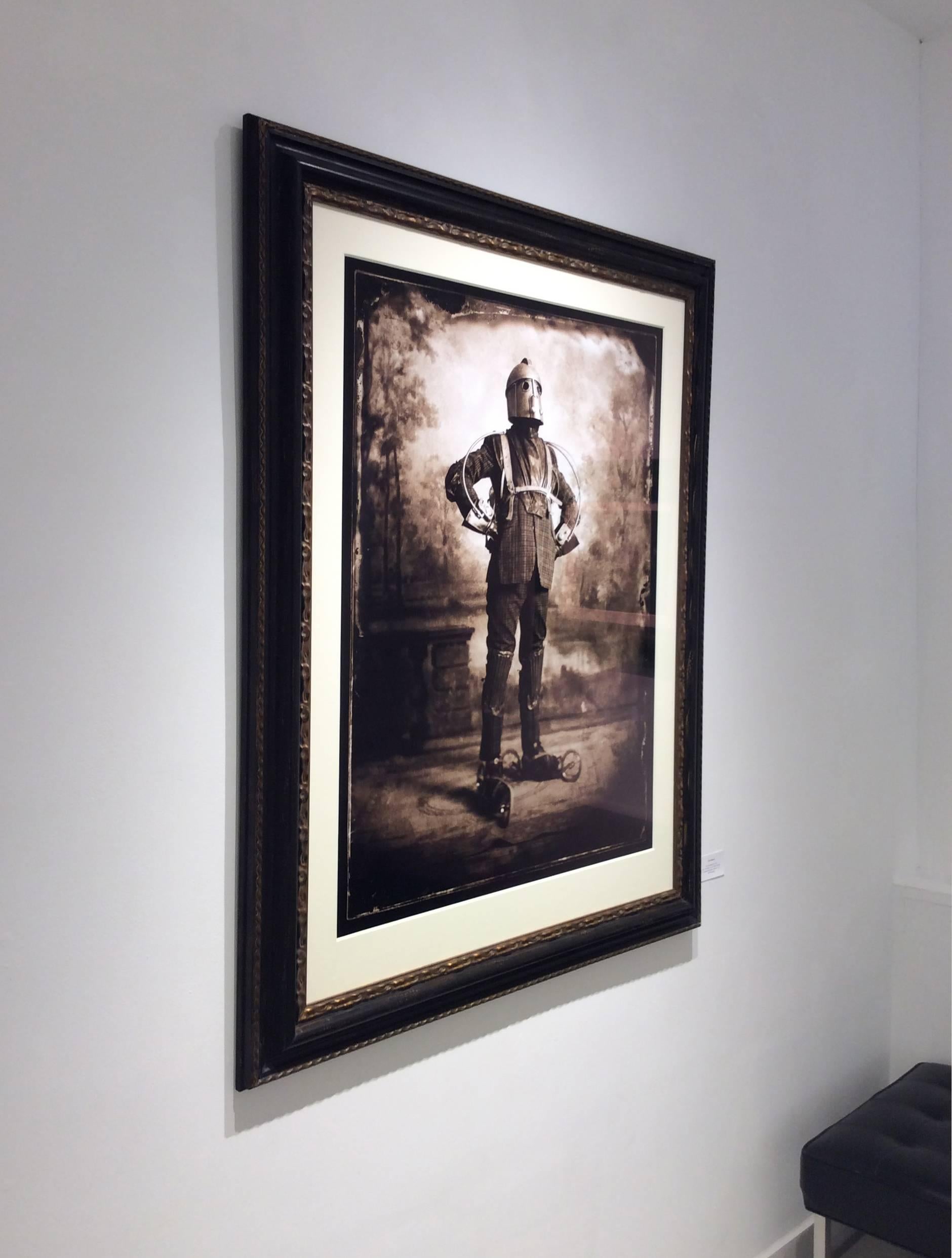 C-type archival print, edition 1 of 3
40 x 30 inches unframed
54 x 43 inches in ornate wood frame with engraved gold detail

This antique style figurative photograph was created by London based photographer, Nick Simpson, in 2012. Here, the artist