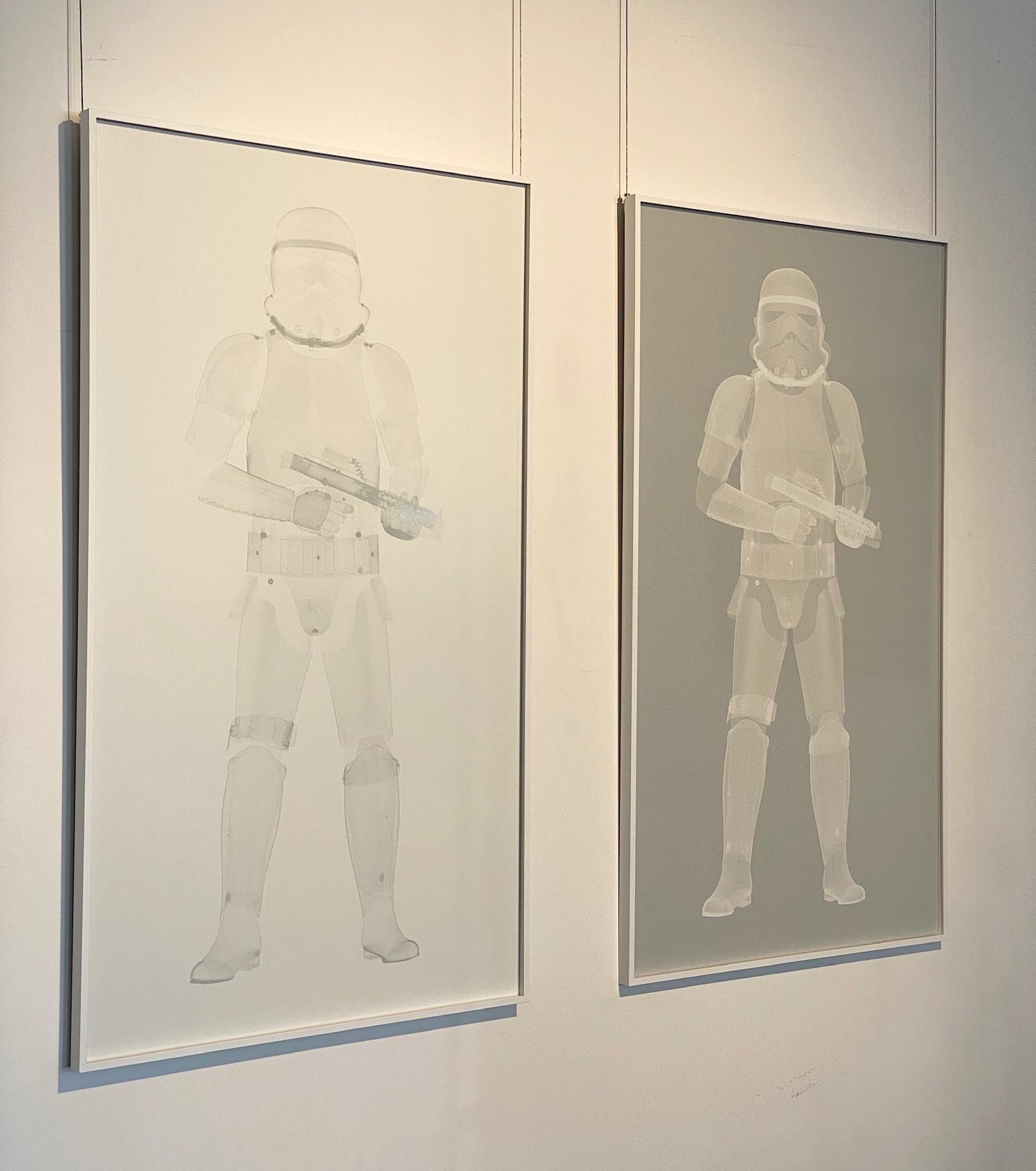 Nick Veasey
Stormtrooper Diptych
47 x 27.5 inches each, Edition of 15
X-ray image printed white onto retroreflective vinyl. 
A high intensity prismatic art piece that constantly interacts with light.
Signed and numbered by artist

Currently on