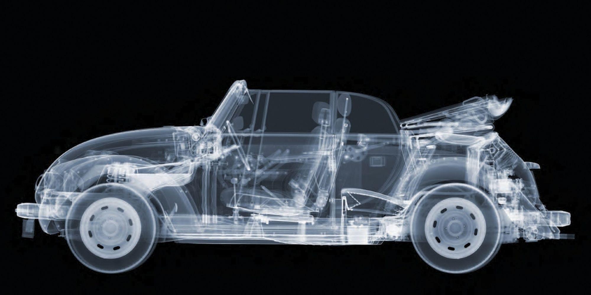 "VW Cabriolet"
21 x 42.5 inches 
X-Ray C-Type print with Diasec frame 
Limited Edition 2 of 25

X-Ray print of a gift VW Cabriolet car. Artist Nick Veasey explores the intersection between science and art by creating a unique and detailed work that