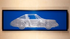 Silver Porsche 911 on Blue
