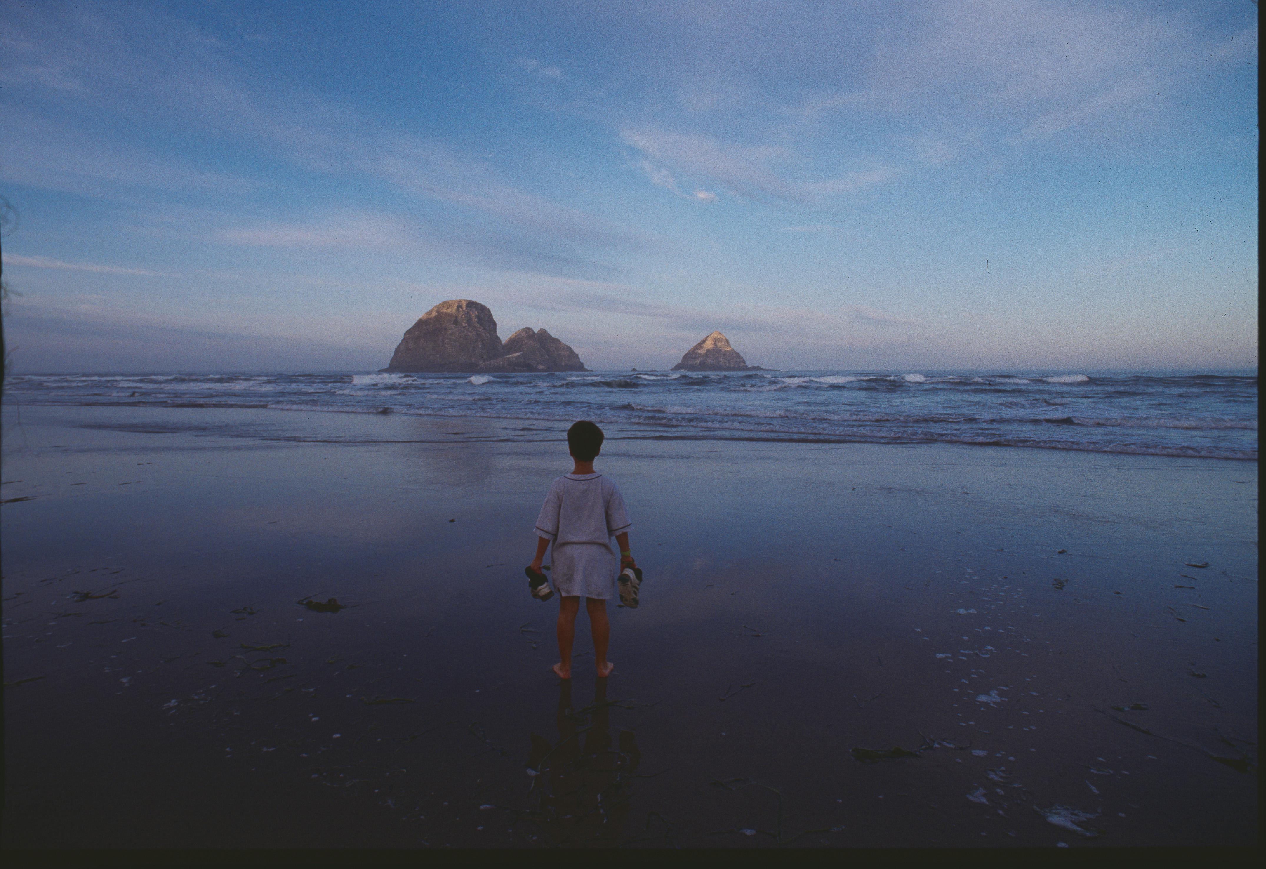 Boy on a Beach - Photograph by Nick Vedros