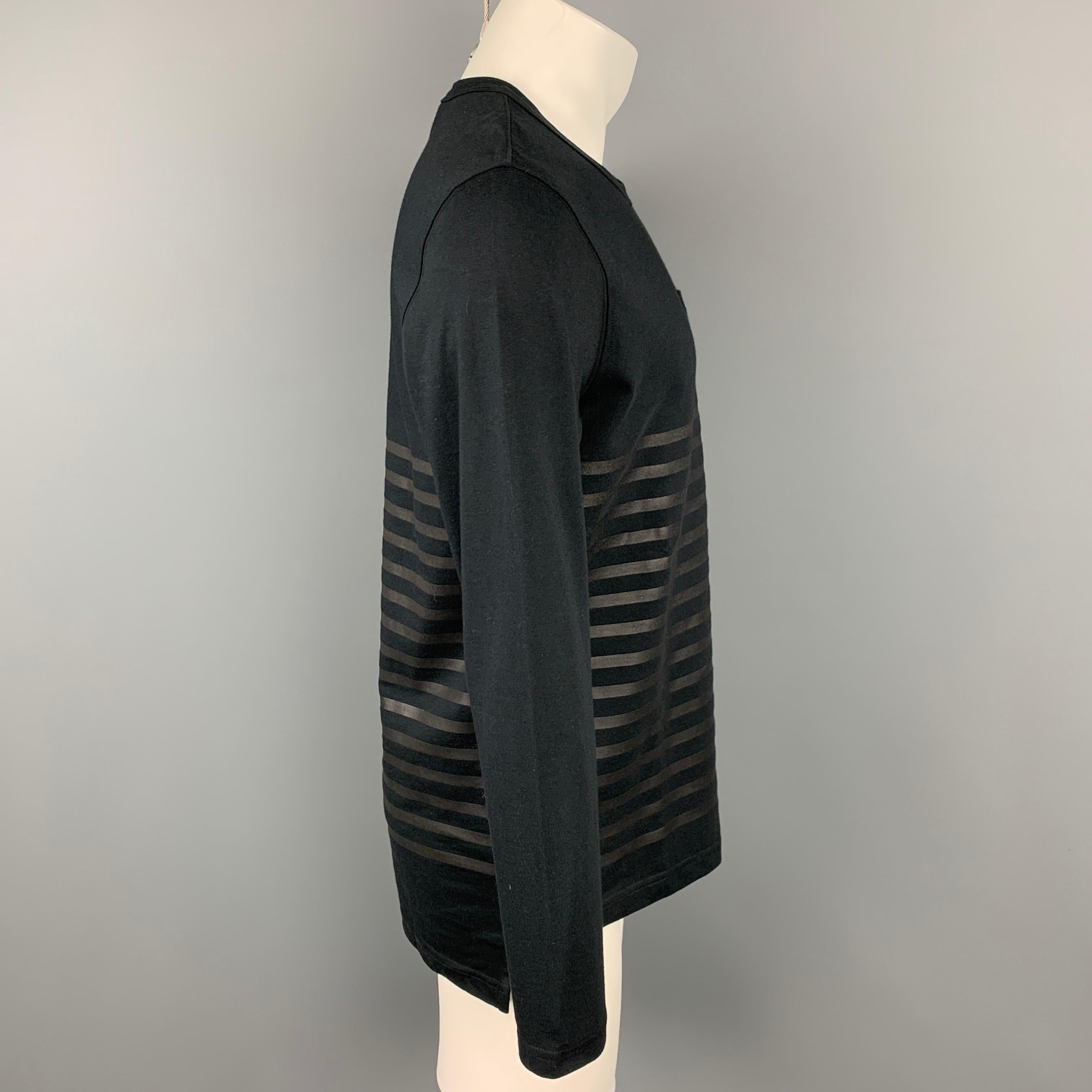 NICK WOOSTER x PAUL SHARK pullover comes in a black stripe cotton featuring a front logo patch, front pocket, and a crew-neck. Made in Italy.

Very Good Pre-Owned Condition.
Marked: L

Measurements:

Shoulder: 18.5 in.
Chest: 42 in.
Sleeve: 26