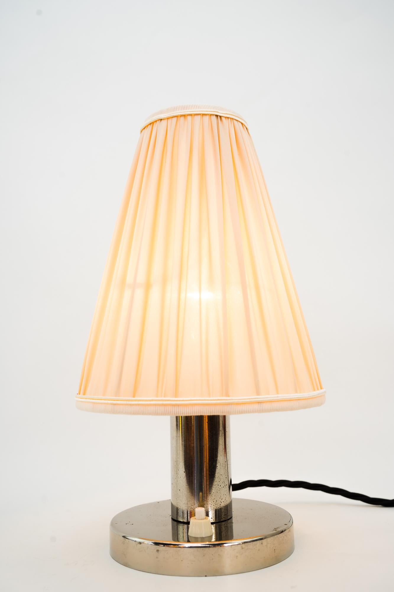 Nickel Art Deco table lamp vienna around 1920s
Original condition
Shade is replaced ( new ).