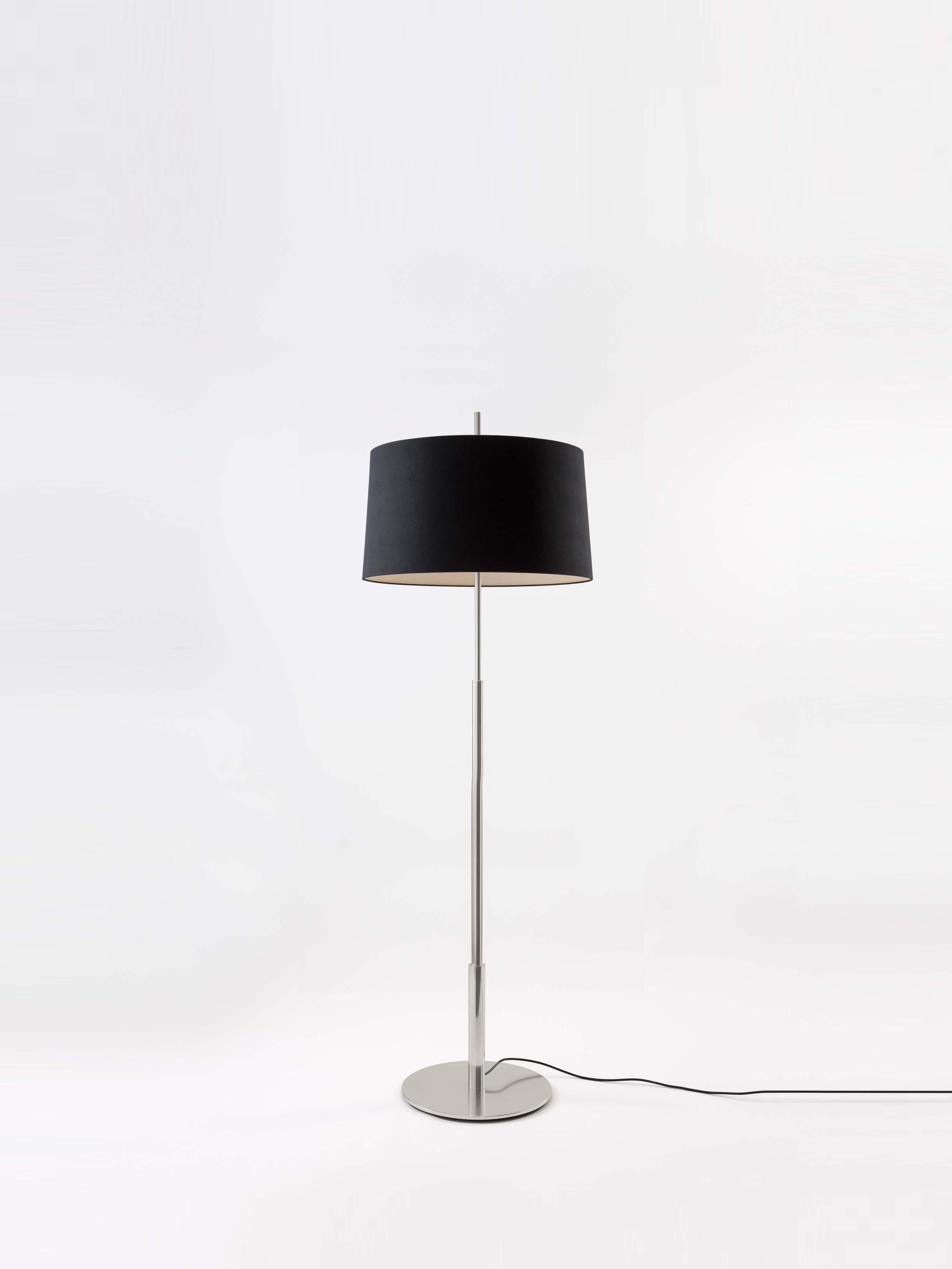 Nickel Diana floor lamp by Federico Correa, Alfonso Milá, Miguel Milá
Dimensions: D 45 x H 146 cm
Materials: Metal, linen.
Available in nickel or gold and in black or white shade.

In keeping with the calling of its creators, the Diana lamp has