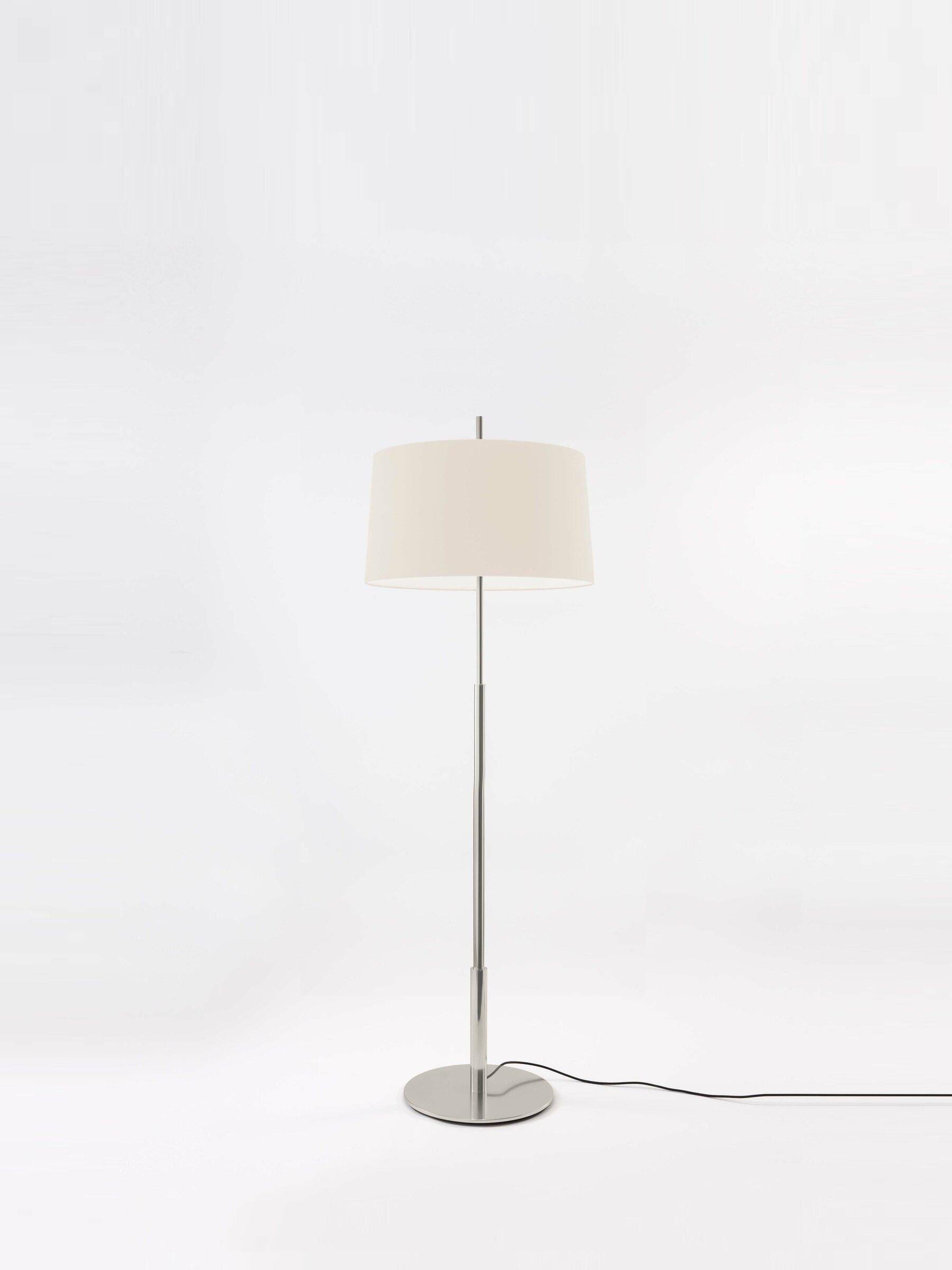 Nickel diana floor lamp by Federico Correa, Alfonso Milá, Miguel Milá
Dimensions: D 45 x H 146 cm
Materials: Metal, linen.
Available in nickel or gold and in black or white shade.

In keeping with the calling of its creators, the Diana lamp has