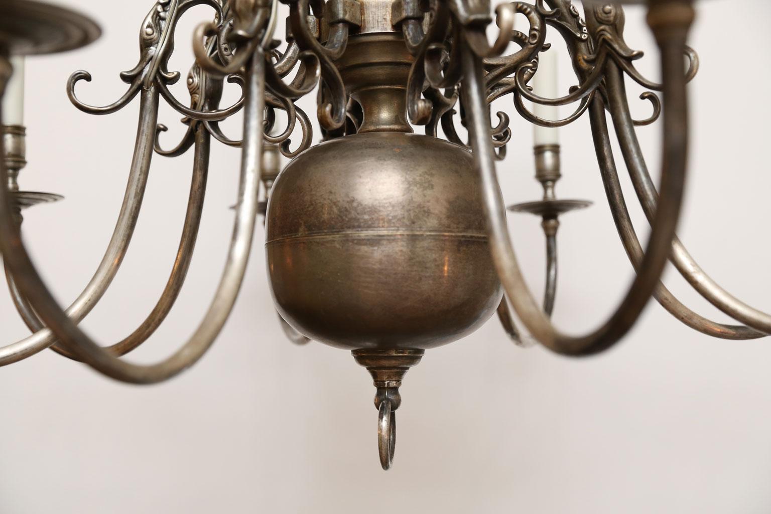 Nickel on bronze Georgian style chandelier (circa 1940s) with eight arms each. Candelabra-size sockets and newly wired for use within the USA. Wonderful color and natural patina. Includes chain and canopies. They are heavy and of interesting color.