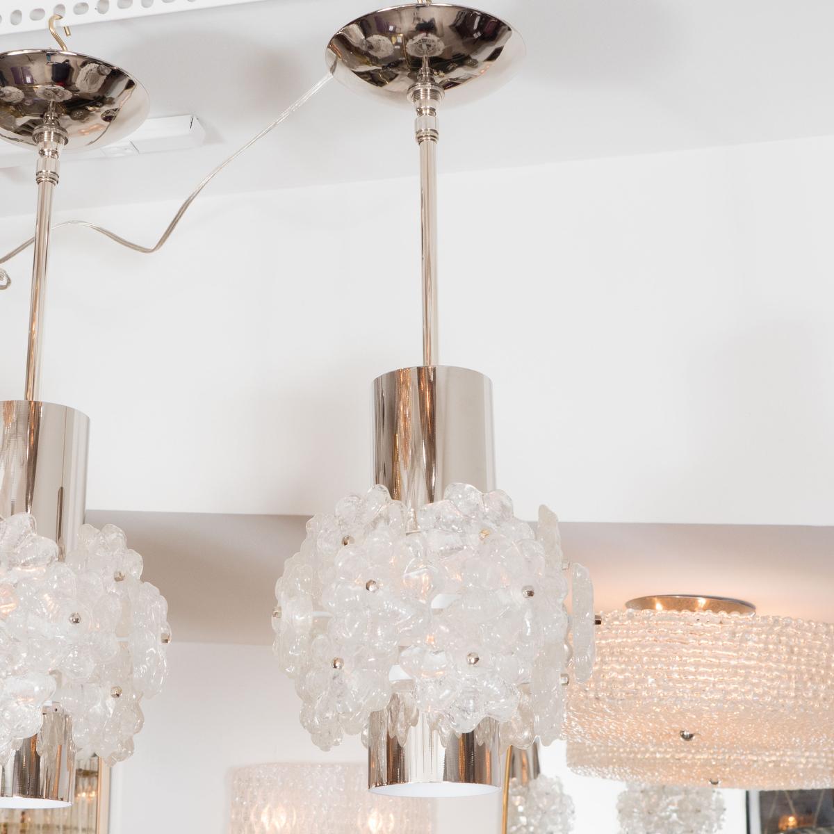 Cylindrical nickel pendant fixture featuring Lucite flower clusters.
