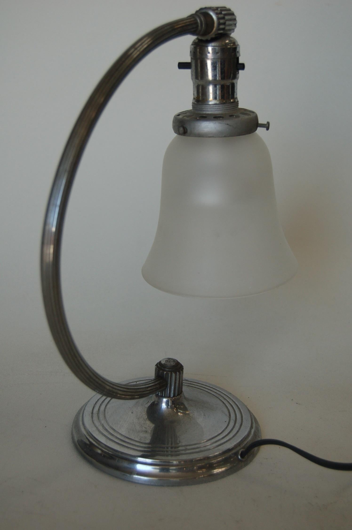 1930s polished nickel-plated accent reading table lamp with frosted glass. Measures 10