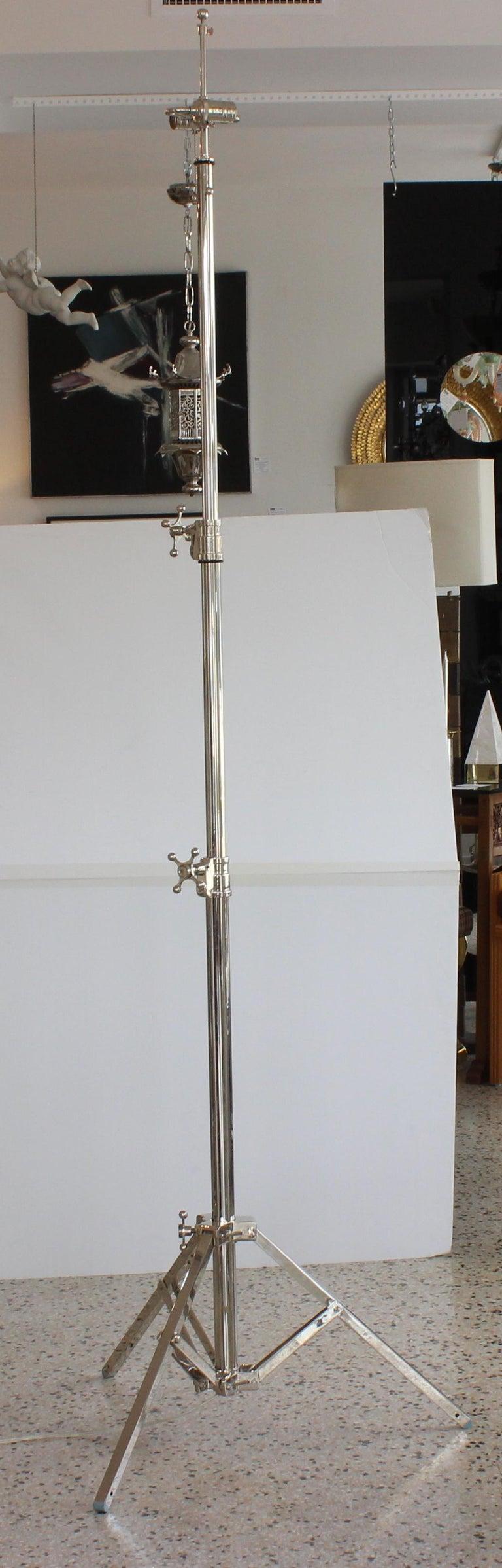 This stylish and chic adjustable floor lamp by Visual Comfort will make a statement with its form and use of materials. 

Note: The piece has a great range of adjustment from 67.75