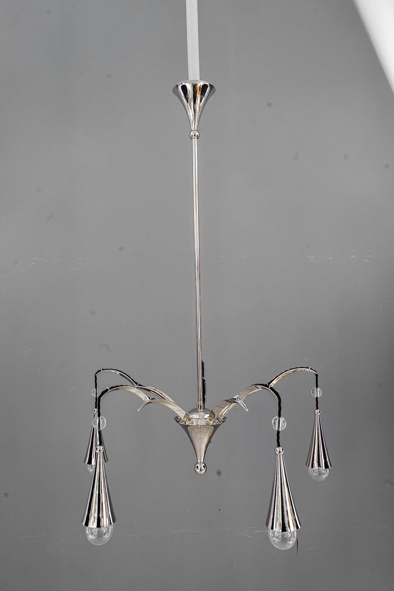 Nickel - Plated art deco chandelier vienna around 1920s
Brass, nickel-plated
With glass balls on the wire