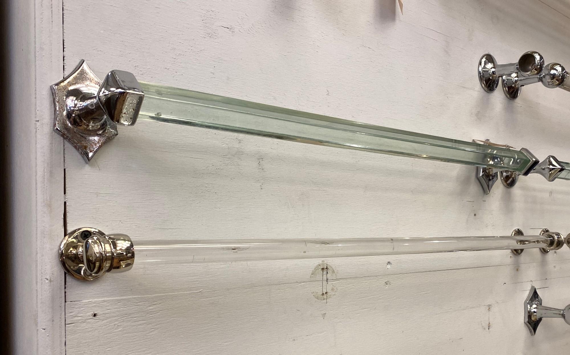 Mid-20th century clear glass towel rod with round nickel plated brass brackets at each end. Manufactured by The Sterling Ham Co. Ltd. of England. Well known for their luxury high quality bathroom products. This can be seen at our 333 West 52nd St