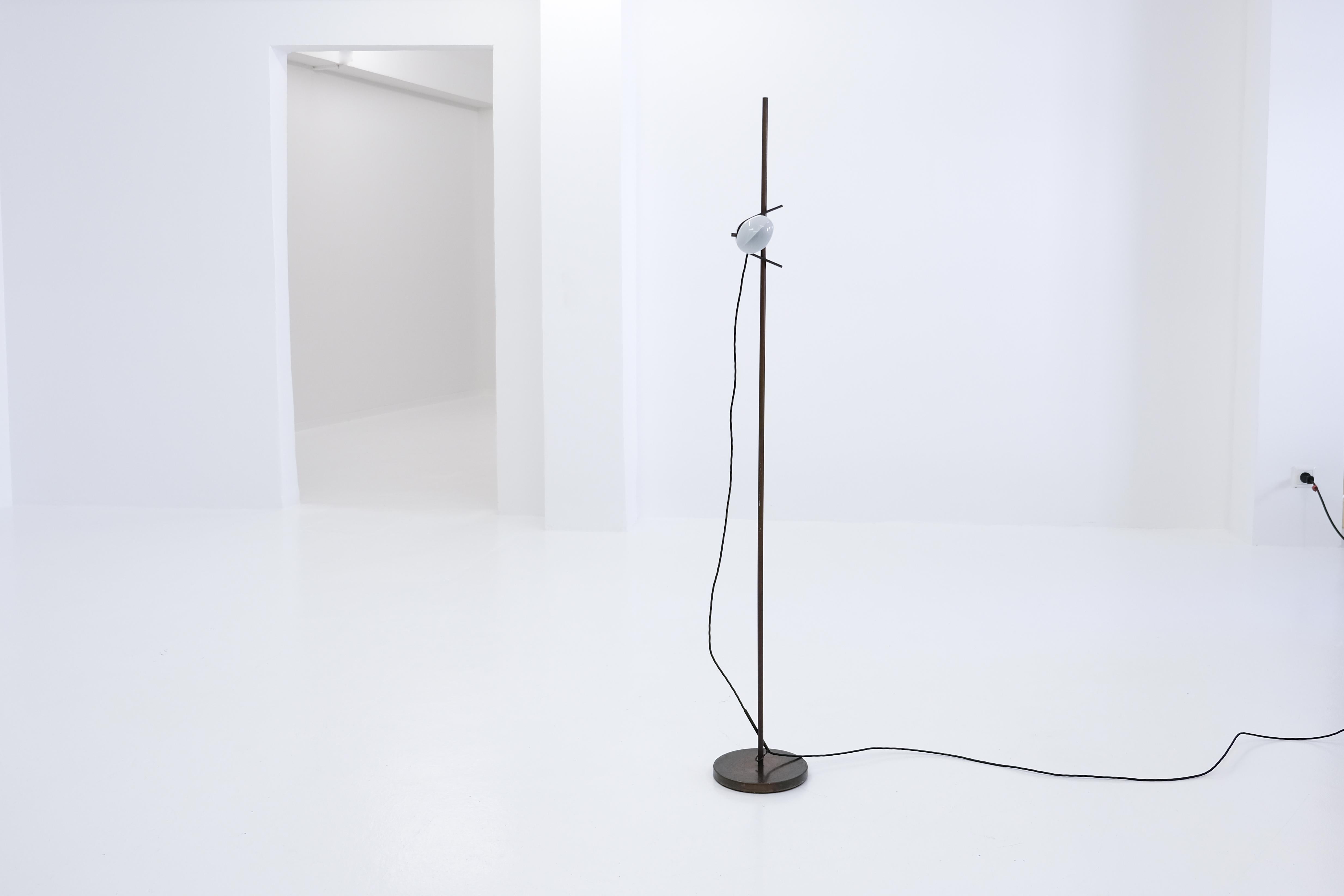 nickel-plated brass floor lamp '399' from the cornalux series, which was first introduced by o-luce in 1958 and is also shown in a video by the company celebrating its best designs. the idea of the flattened and frosted cornalux bulb was to be able