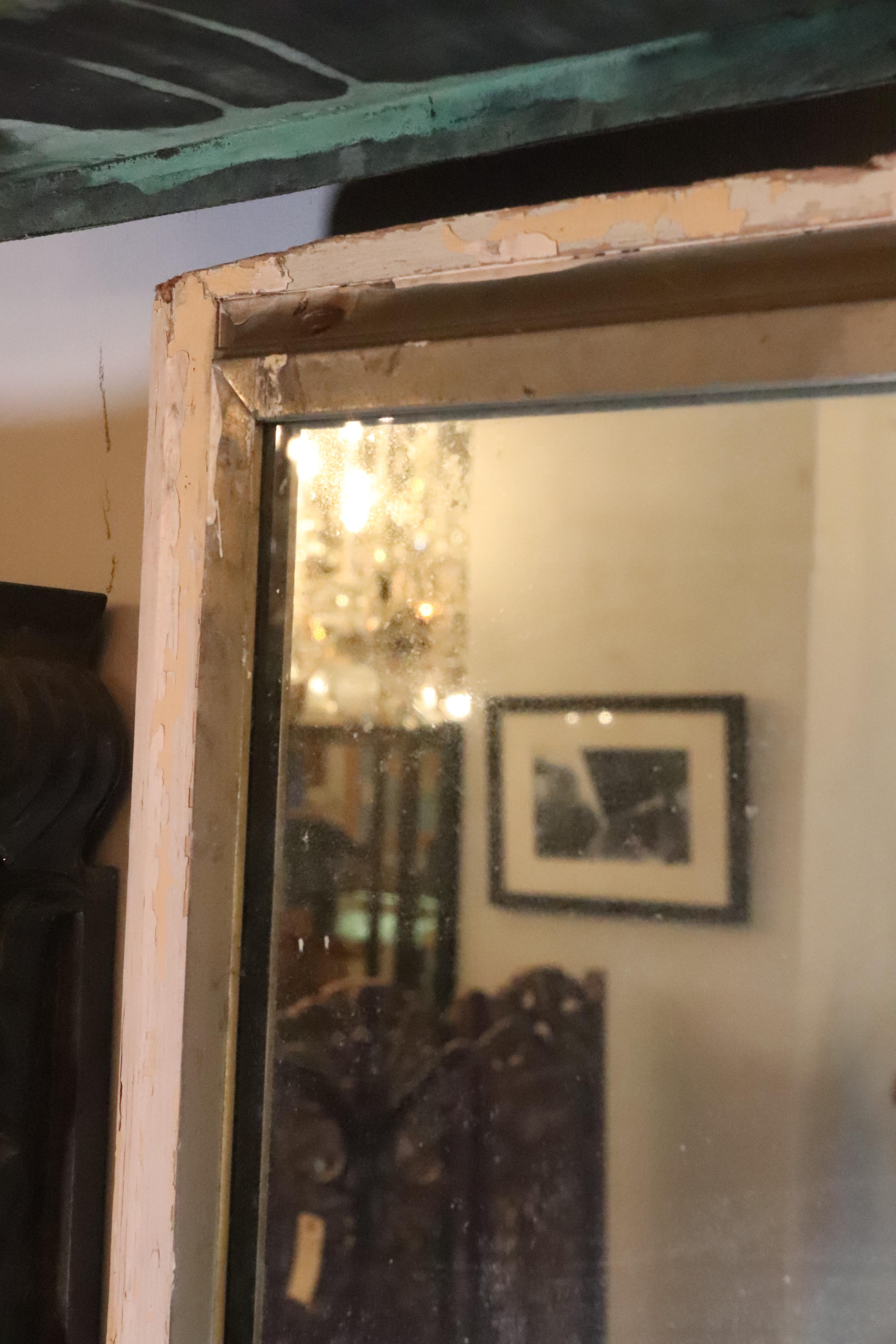 Nickel Plated Brass Mirror Mounted on Cream Door For Sale 1