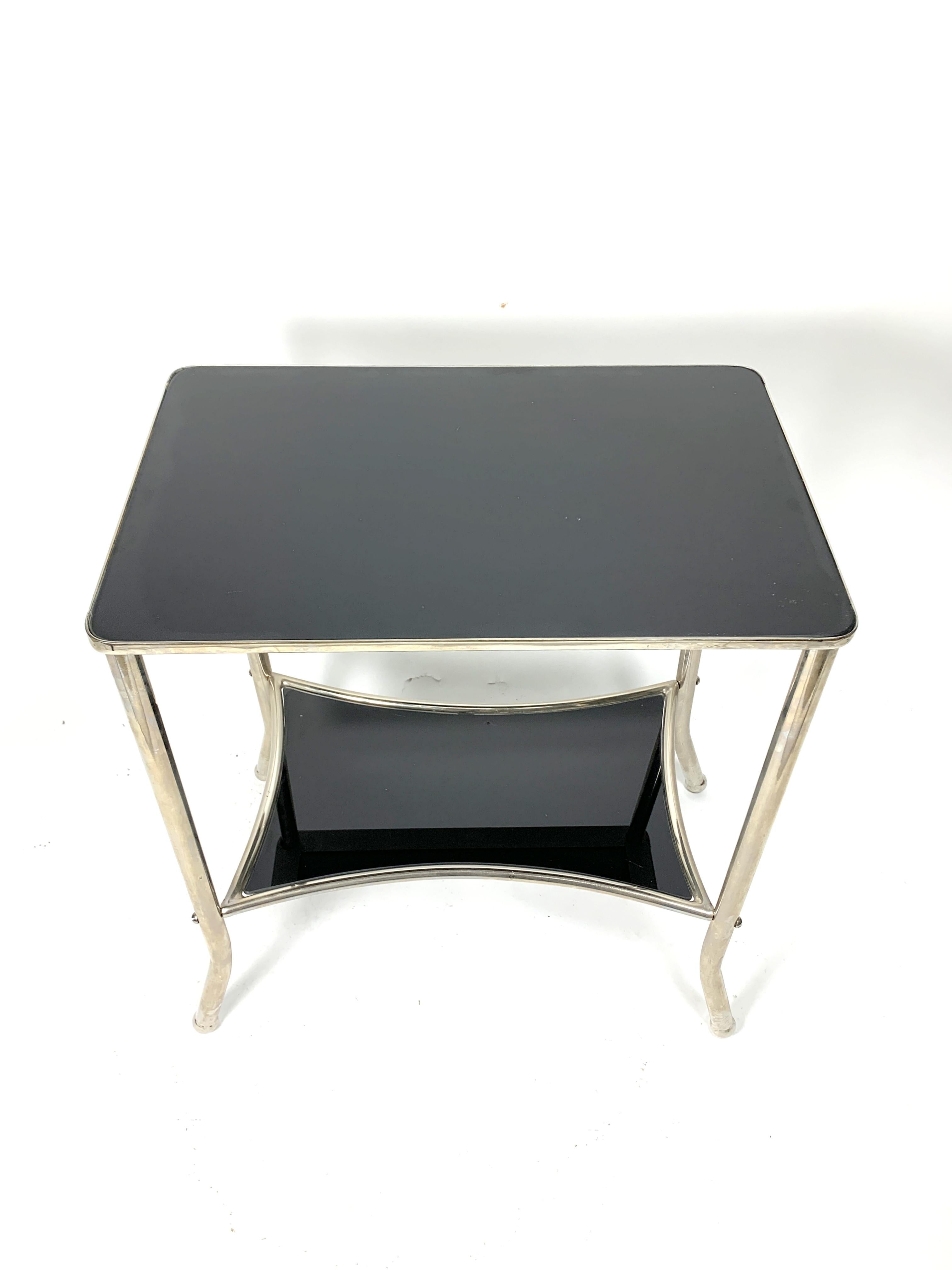 Nickel-plated console table with black glass, 1930s.