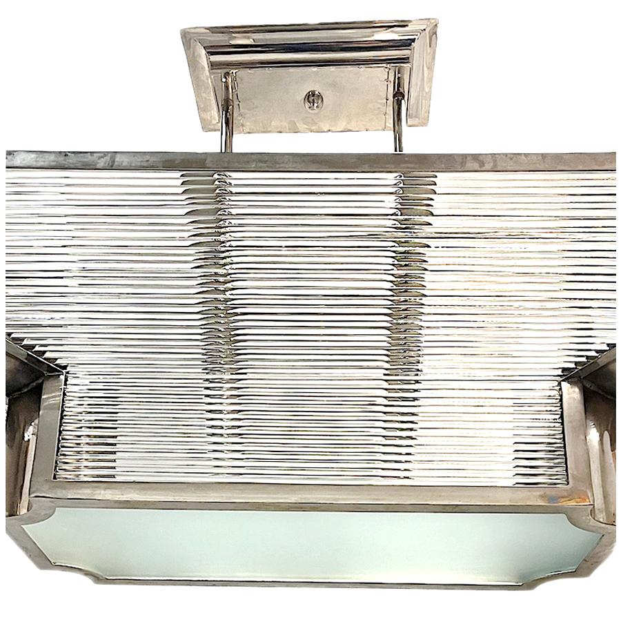 A circa 1960's French Art Deco style nickel plated light fixture with glass rods insets.

Measurements:
Drop: 25
