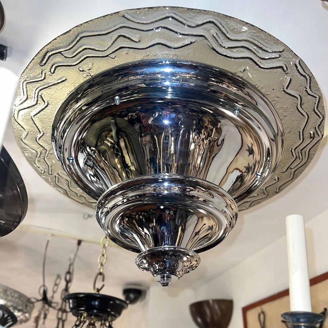 A circa 1960's Italian light fixture with molded glass inset in a smoke color.
Four candelabra interior lights.
 
Measurements:
Current Drop: 21.5