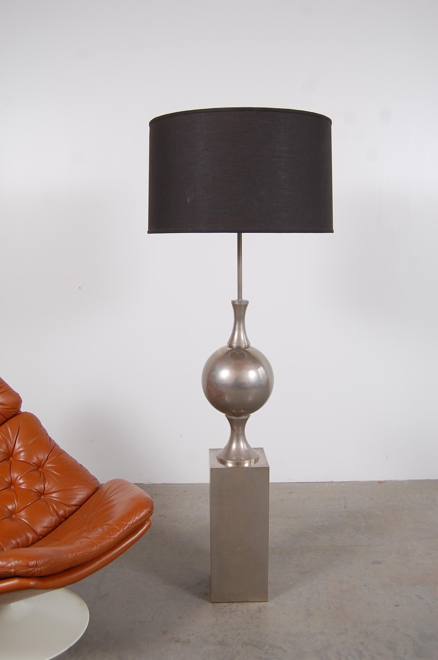 Floor lamp designed by Philippe Barbier, France, circa 1968. Lamp is constructed of nickel plated steel. Lamp has been completely re-wired for safety, and dressed up with black cloth covered twist cord.