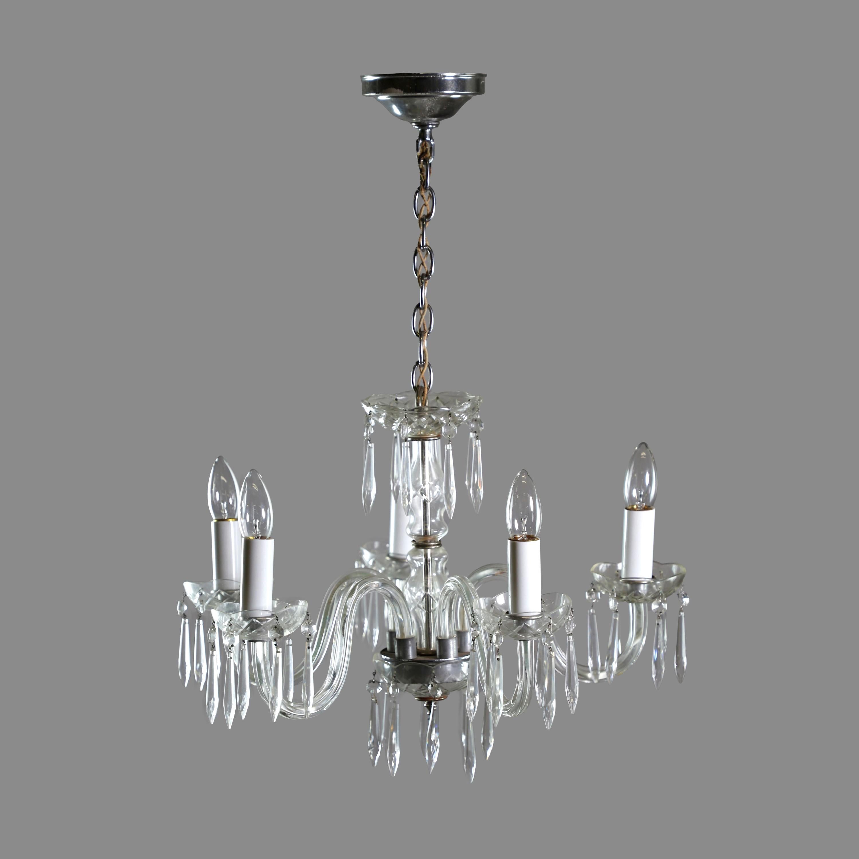 20th century crystal chandelier featuring original nickel plated hardware. Takes five E26 household lightbulbs. Cleaned and restored. This can be seen at our 400 Gilligan St location in Scranton, PA.