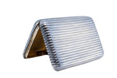Nickel plated silver cigarette case with fluted bands and hinged lid