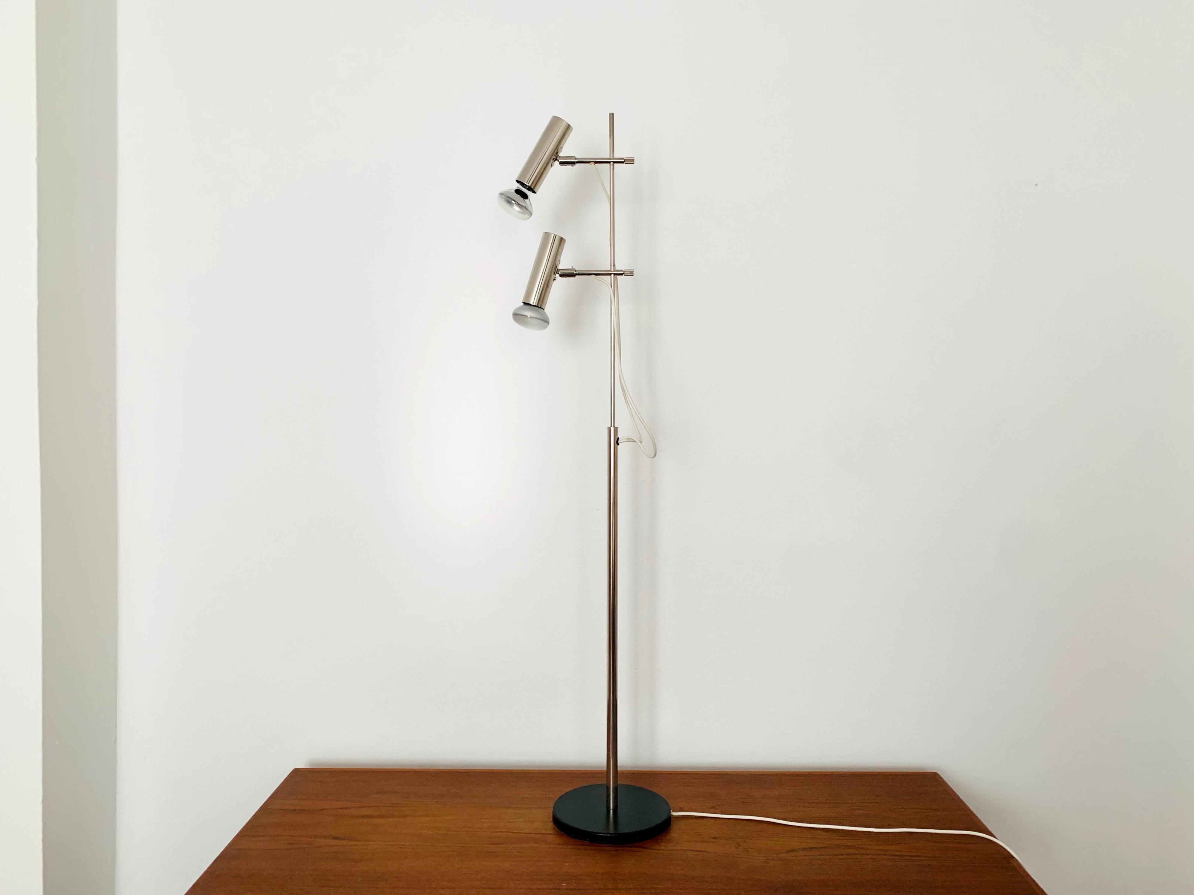 Stunning floor lamp from the 1960s.
Very unusual design and very high quality workmanship.
Individually adjustable spots.
An absolute highlight for every home.

Design: Gino Sarfatti (attributed)
Manufacturer: Arteluce