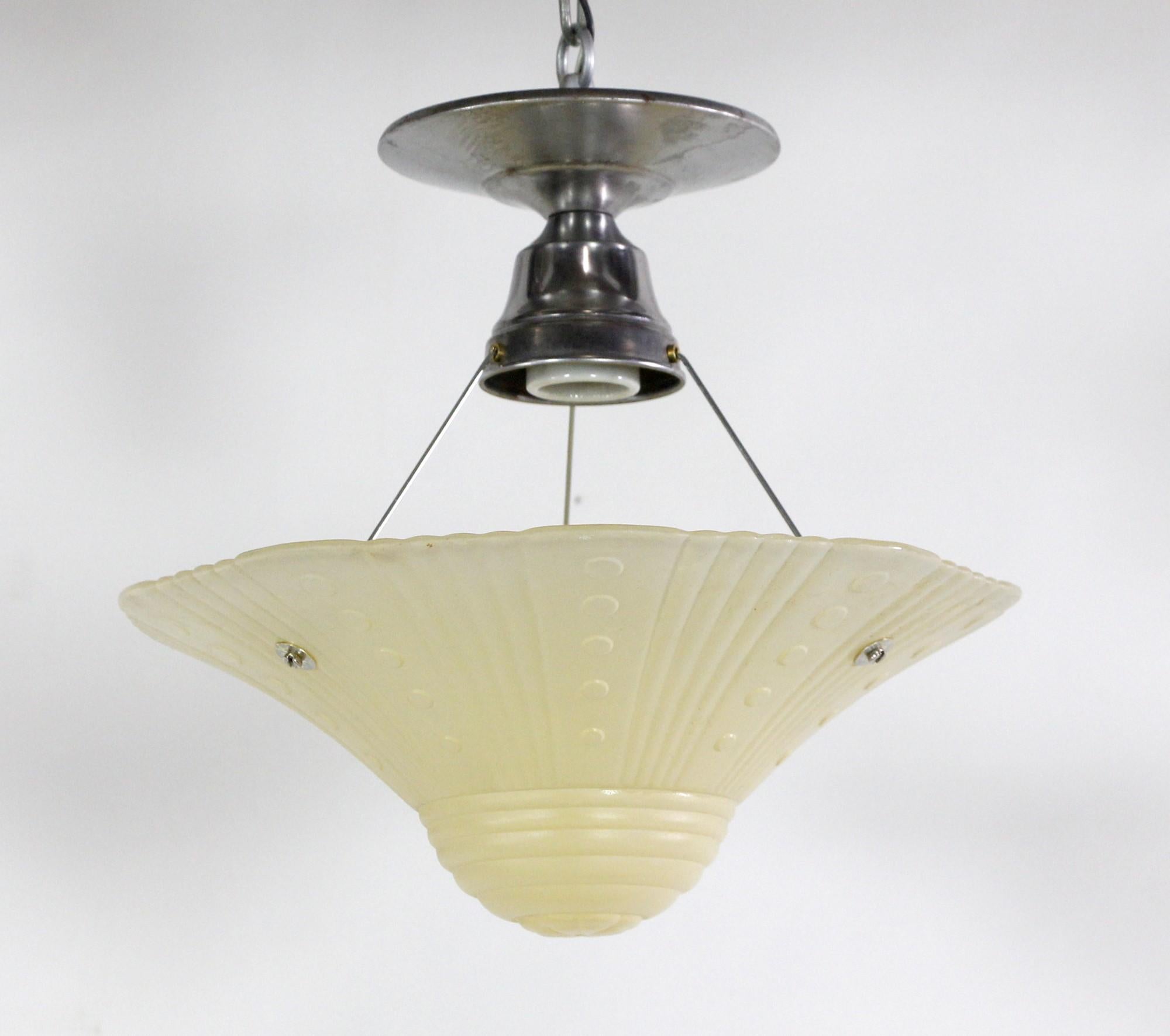 1940s Art Deco style dotted design glass shade light with a newly wired nickel plated steel fixture. Takes one E26 light bulb. This can be seen at our 400 Gilligan St location in Scranton, PA.