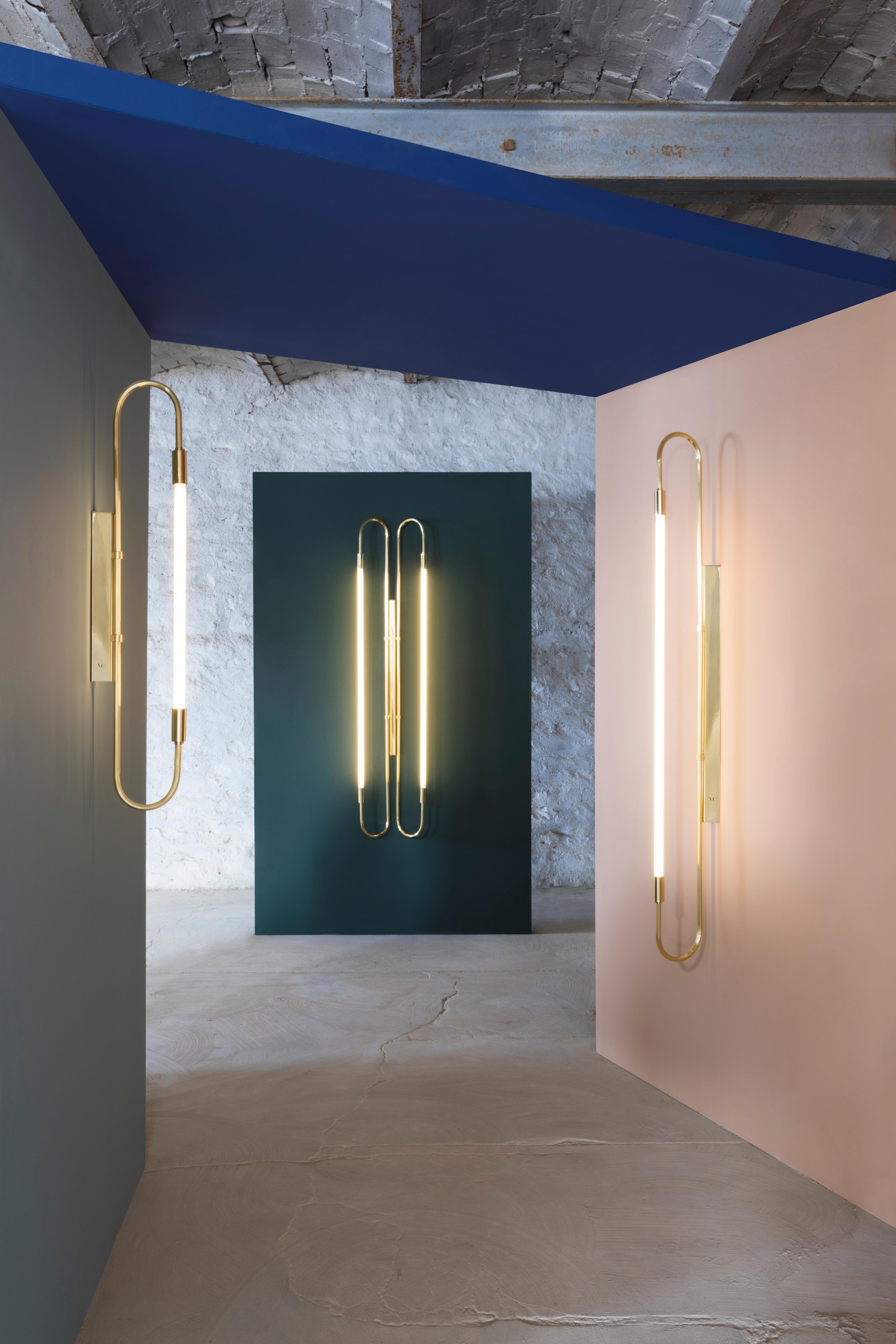 Nickel wall lamp neon double 103 by Magic Circus Editions
Dimensions: H. 103 cm, W. 37 cm, D. 11 cm, 3.6 kg.
Materials: fluted brass tube and glass.
Available finishes: brass (lacquered polished brass, unlacquered polished brass, brushed brass)