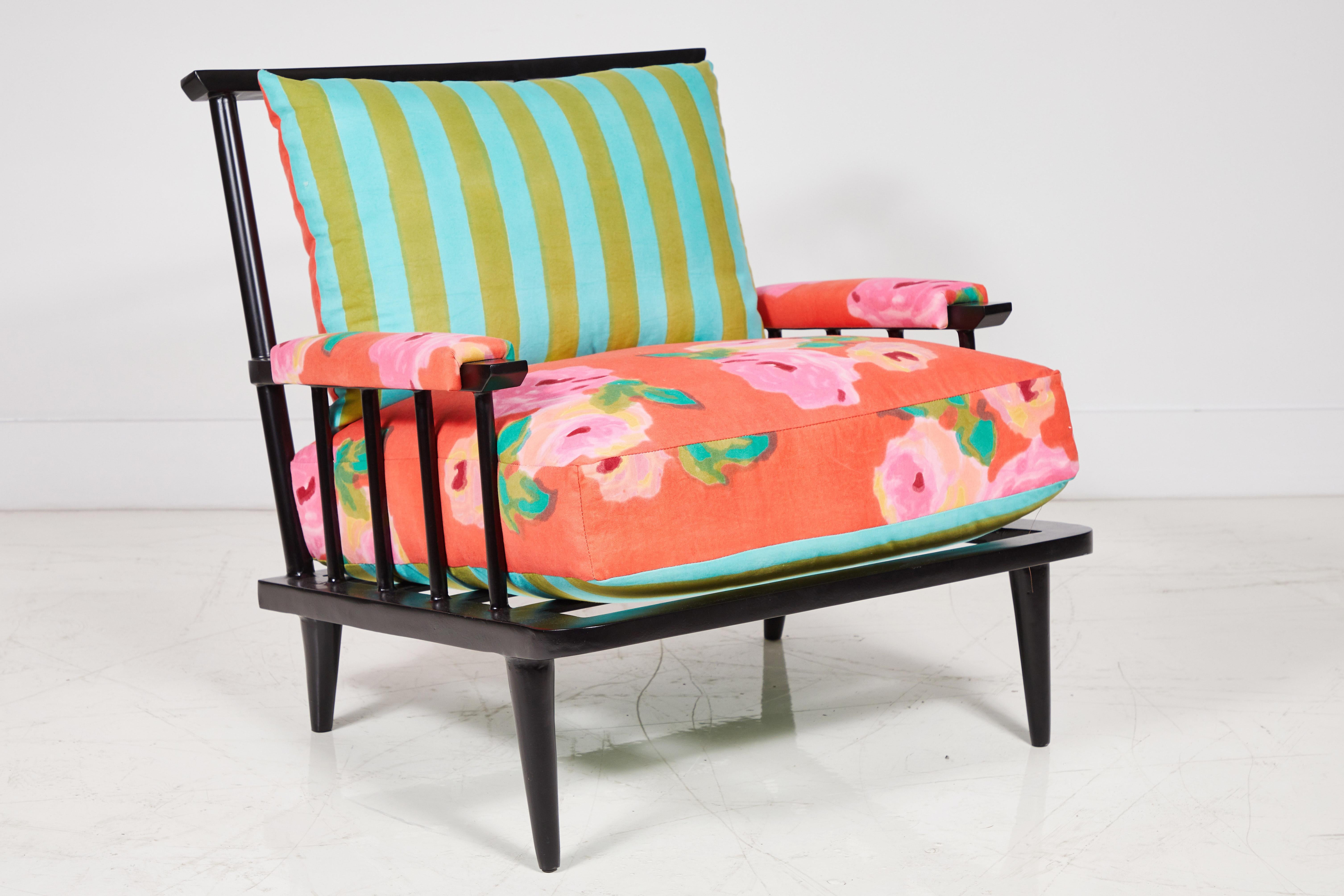 Nickey Kehoe collection metal outdoor spindle chair upholstered in vibrant Lisa Corti floral fabric.