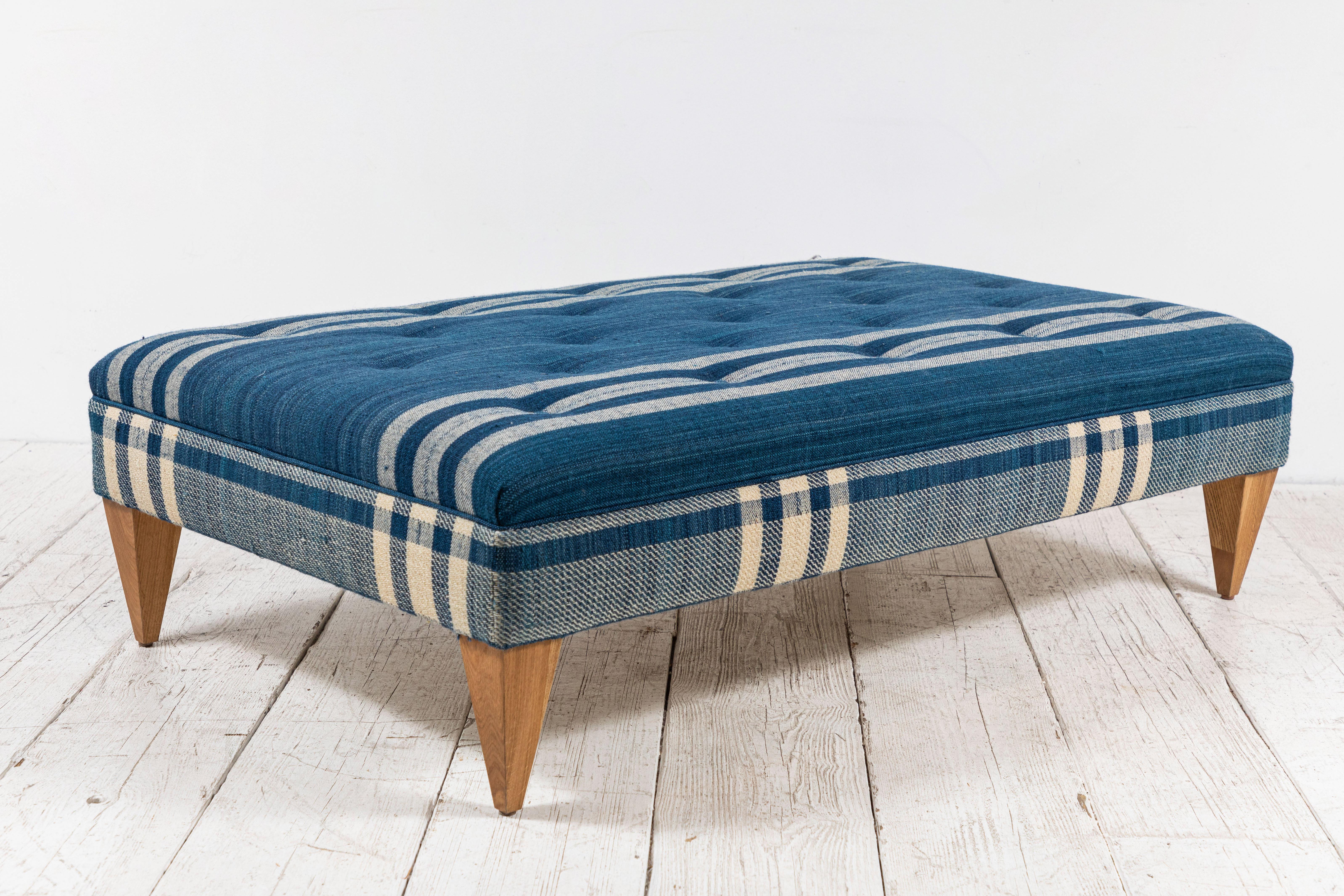 Nickey Kehoe collection tufted ottoman in blue plaid wool by Susan Deliss.
 