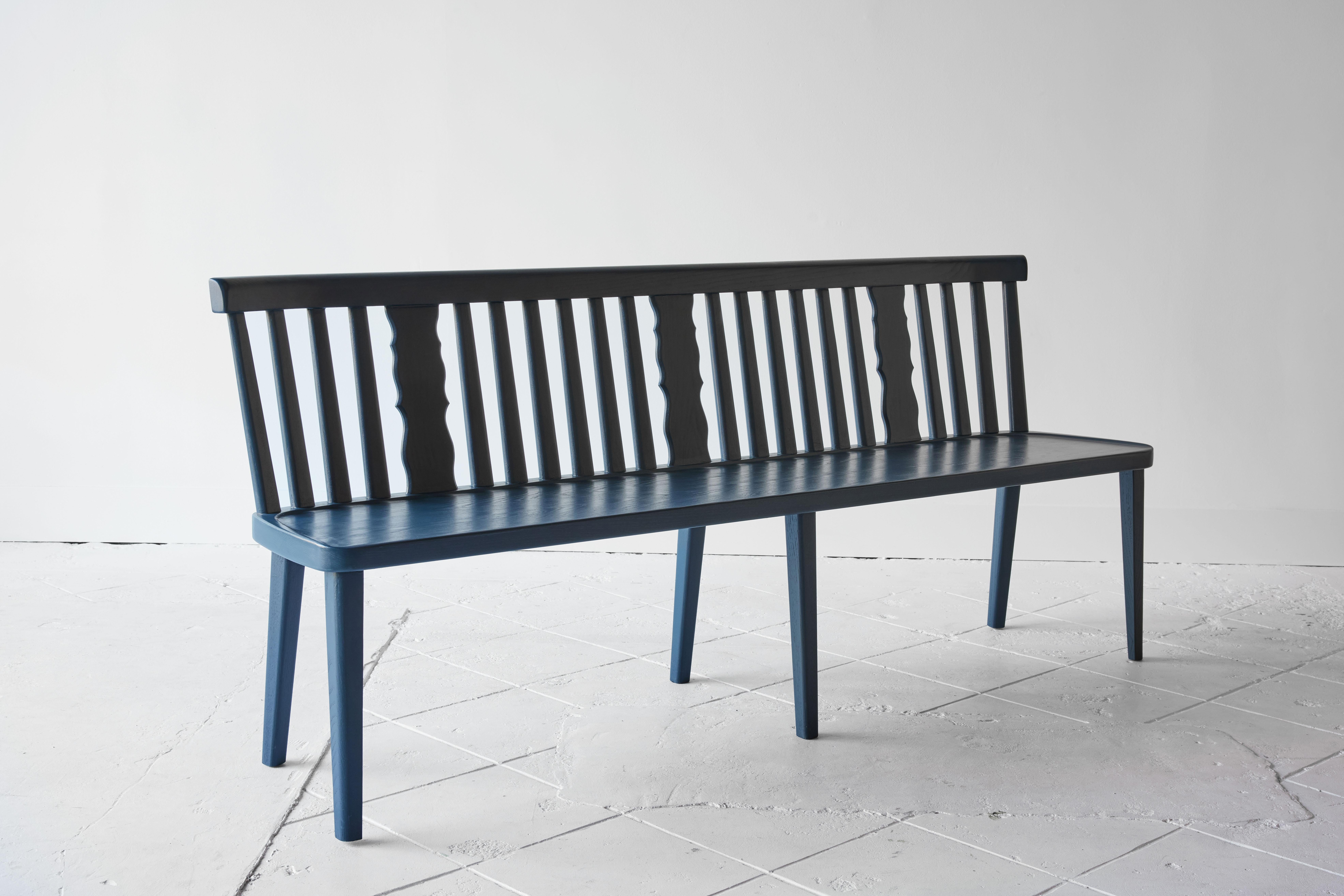 This comfortable bench boasts an open silhouette inspired by rustic European style that is both spectacularly simple and elegantly detailed. Handcrafted in Douglas fir and painted in our signature blue.
