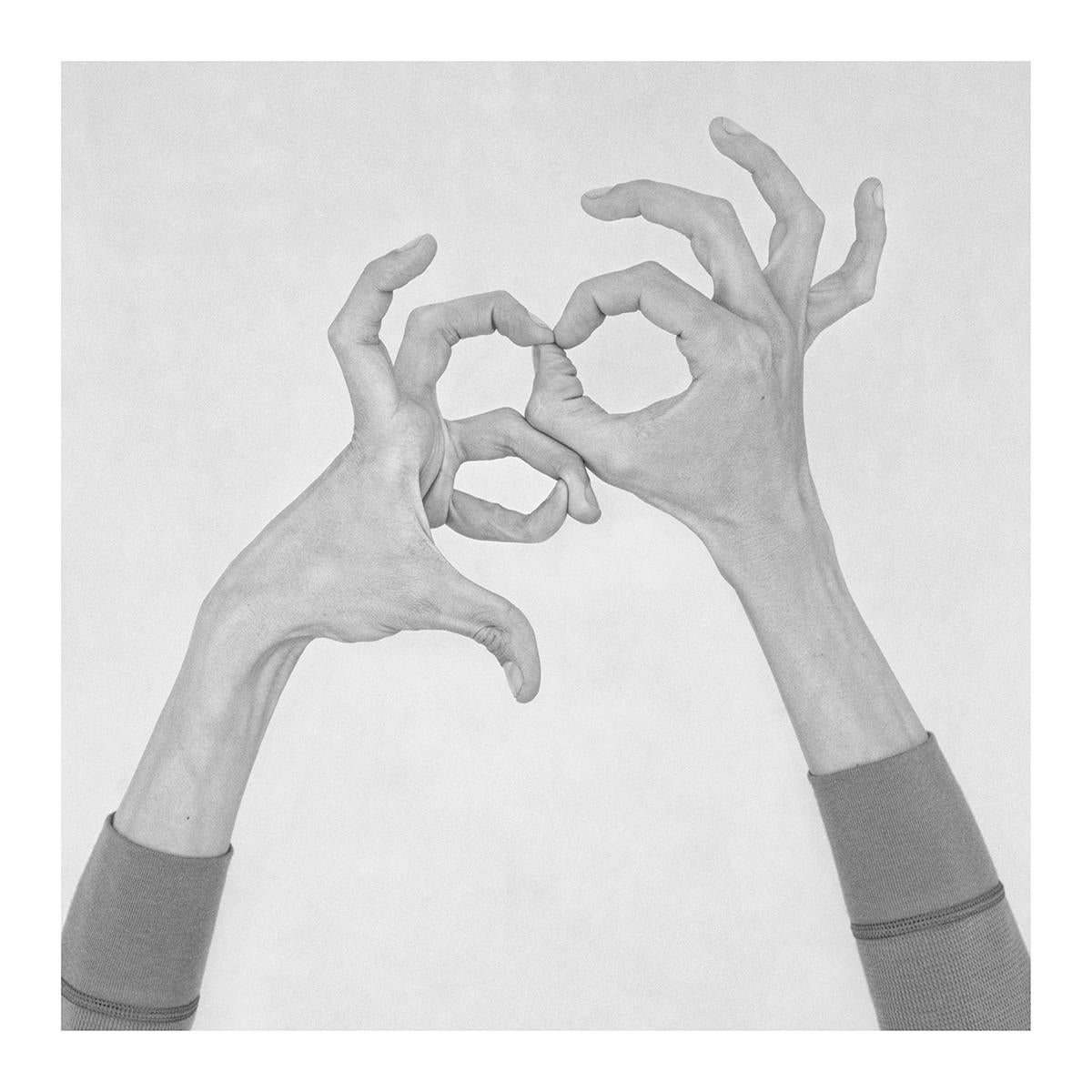 Nico Baixas / Gos-com-fuig Black and White Photograph - Untitled X. From the Series Chiromorphose. Hands. Black & White Photography