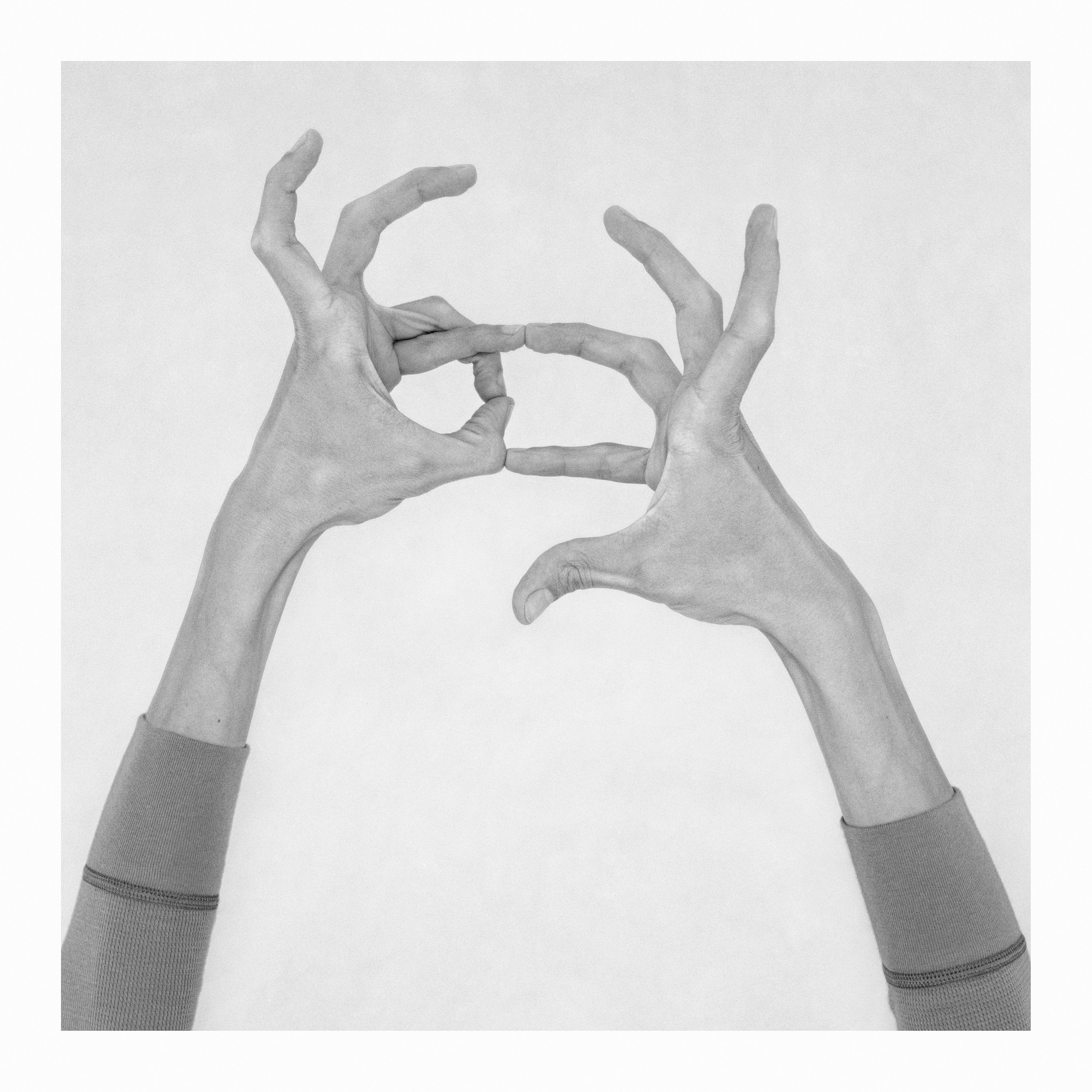 Nico Baixas / Gos-com-fuig Figurative Photograph - Untitled XI. From the Series Chiromorphose. Hands. Black & White Photography