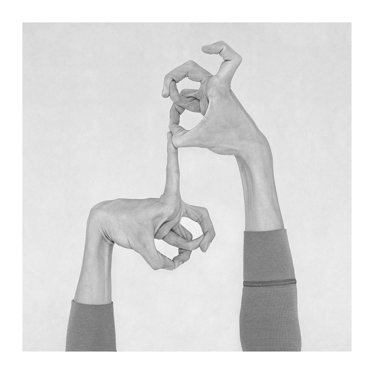 Nico Baixas / Gos-com-fuig Black and White Photograph - Untitled XIX. From the Series Chiromorphose. Hands. Black & White Photography