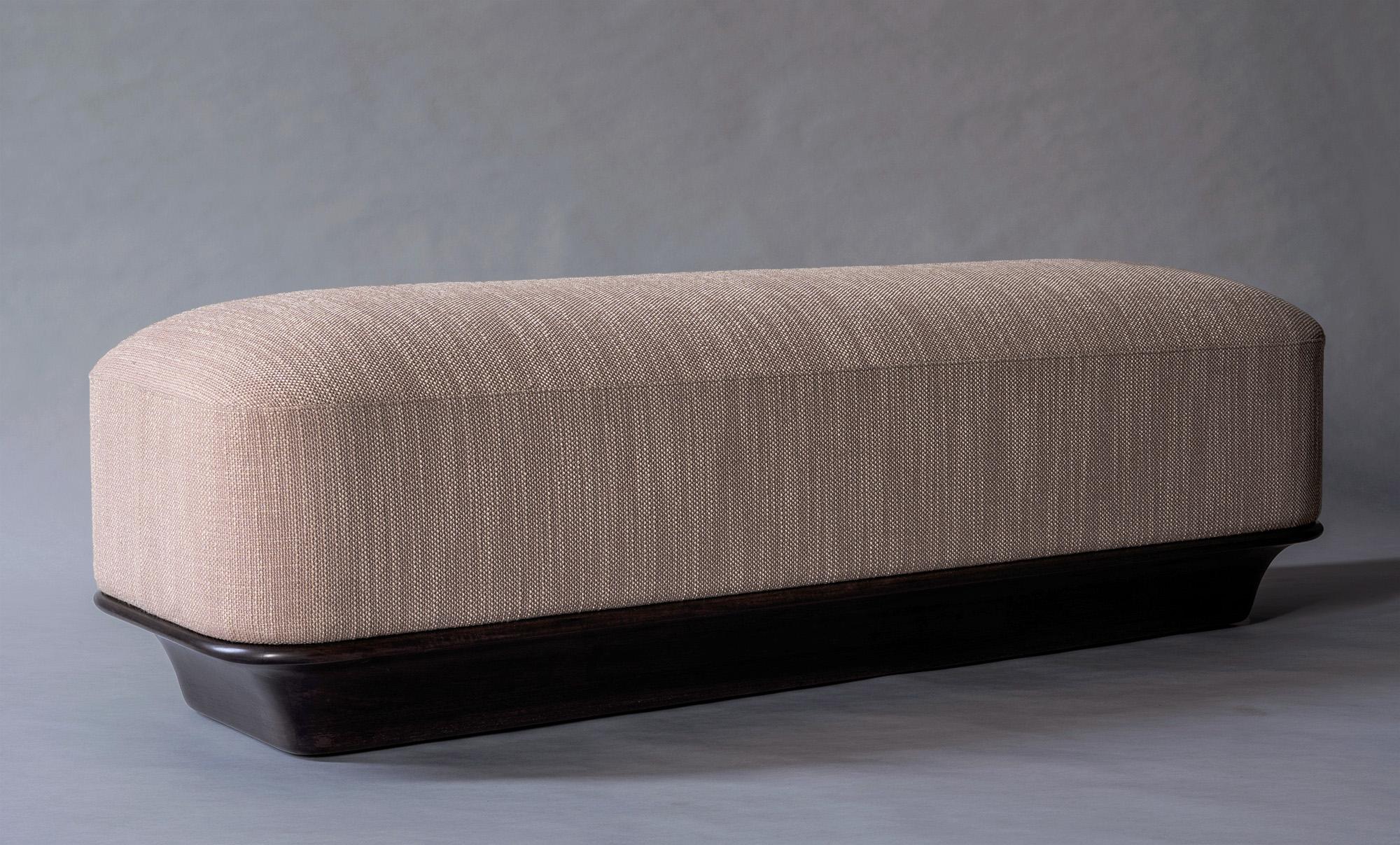 The Nico Bench combines handsome proportions with timeless materials and an emphasis on comfort. Straight lines are tempered by curved edges, resulting in a thoughtful balance of hard and soft elements. Subtle decorative accents, such as the shapely