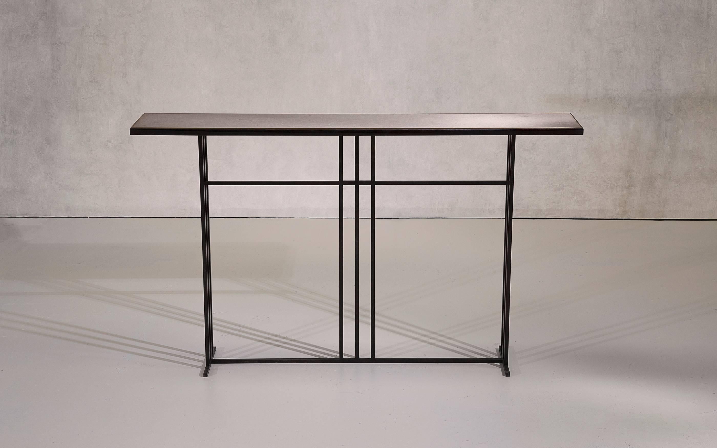 A console table in blackened steel and honed Cumbrian slate, with a polished brass trim. Hand crafted in the North to order. Custom sizes and finishes are available.

Measures: 180cm W x 35cm D x 80cm H. 
Custom sizes available.

Made to order