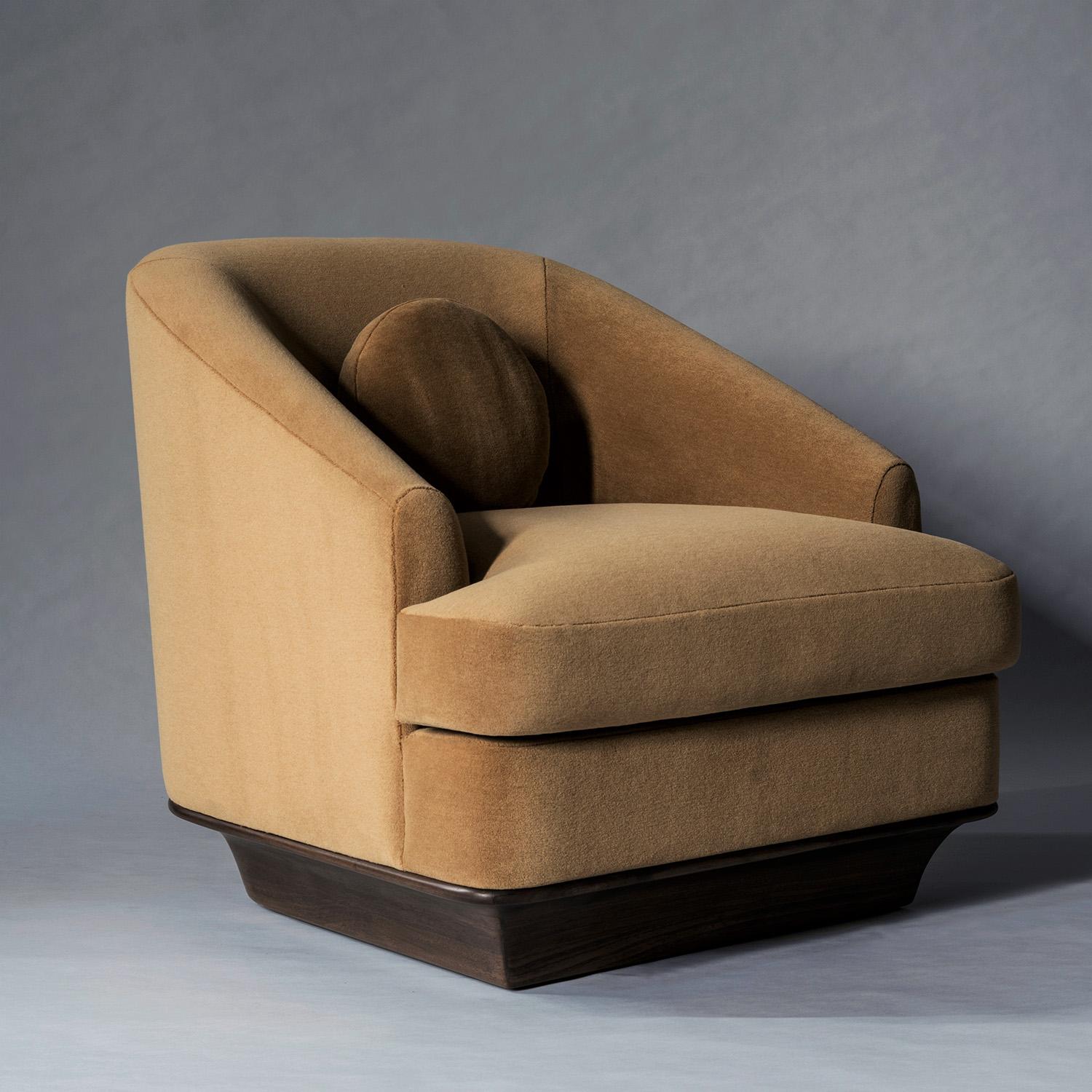The Nico Lounge Chair combines handsome proportions with timeless materials and an emphasis on comfort. Straight lines are tempered by curved edges and sloping arms, resulting in a thoughtful balance of hard and soft elements. Subtle decorative