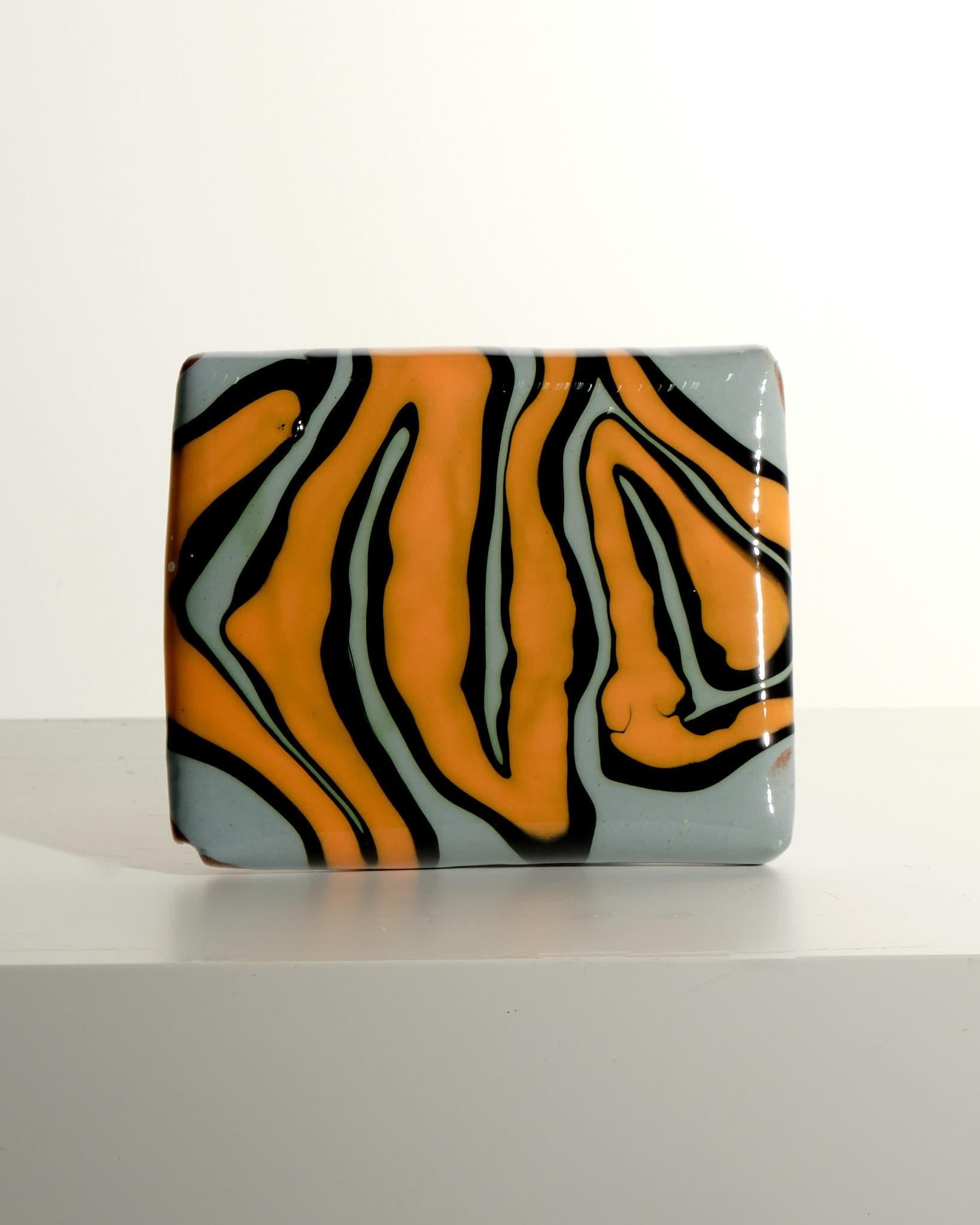 2023
Stoneware, orange, with black and light blue glaze.
