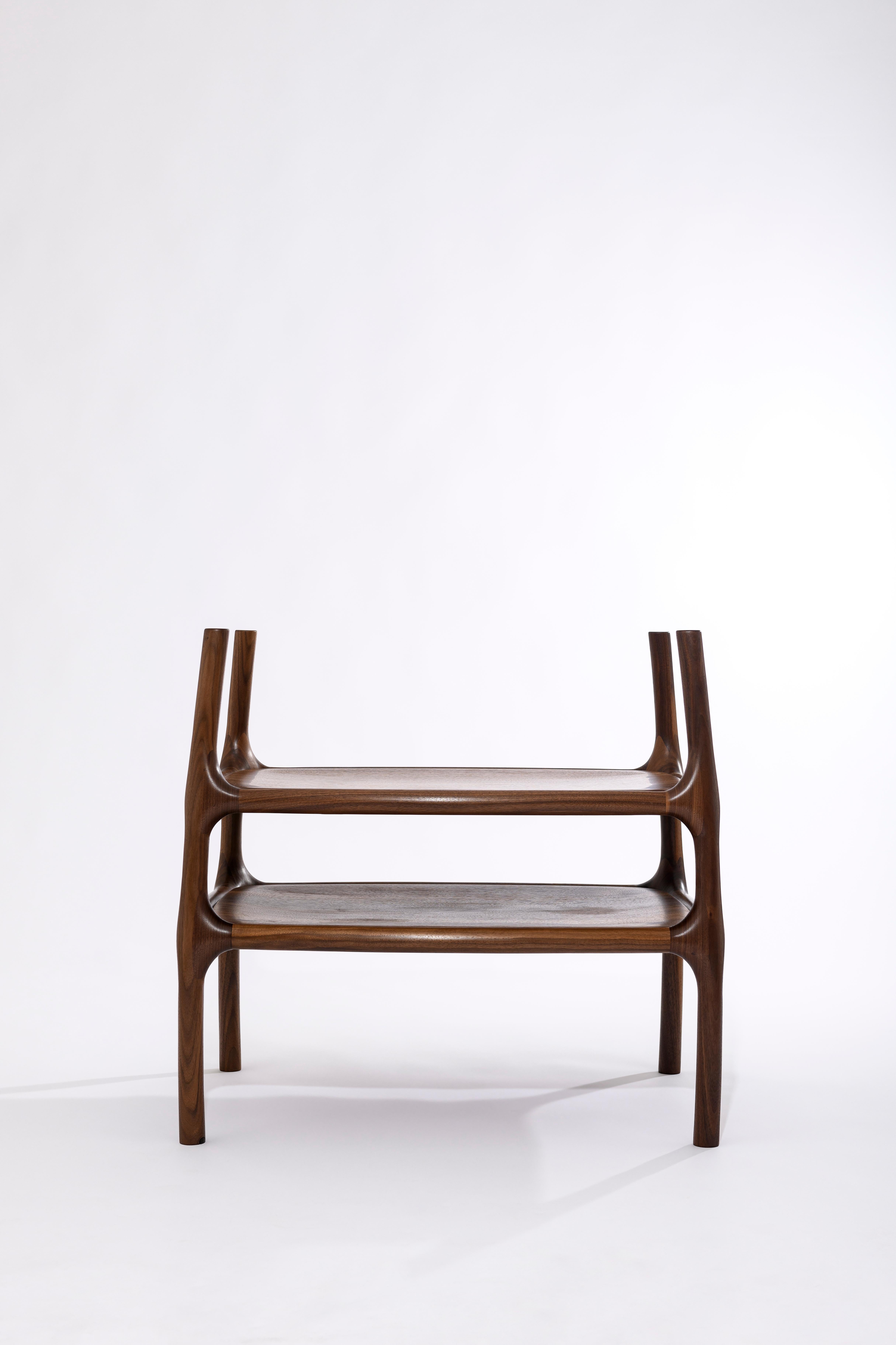 Table basse en noyer Nicola par Atelier Blouberg
Pièce unique.
Dimensions : 58 x 76 x 70 cm : D 58 x L 76 x H 70 cm.
MATERIAL : Noyer.

Disponible en noyer et en chêne. Veuillez nous contacter.

Ruben Van Lerberghe est un designer et fabricant de