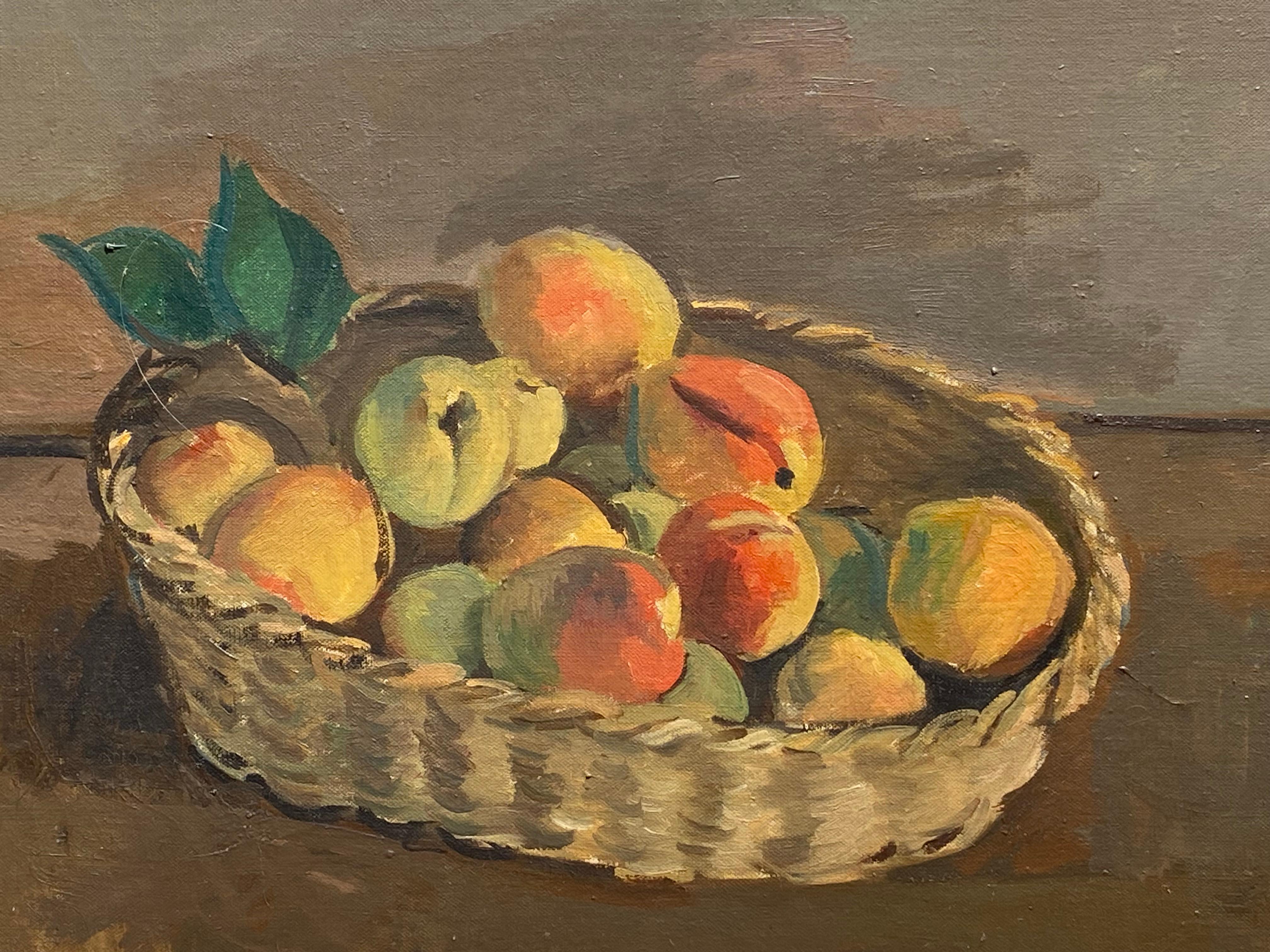 Beautiful oil on canvas still life painting of fruit in a wicker basket by Nicolai Cikovsky.  Signed lower right. Condition is very good. Circa 1945.  The painting is housed in a contemporary gold leaf gallery frame. Overall measurements are 24.25