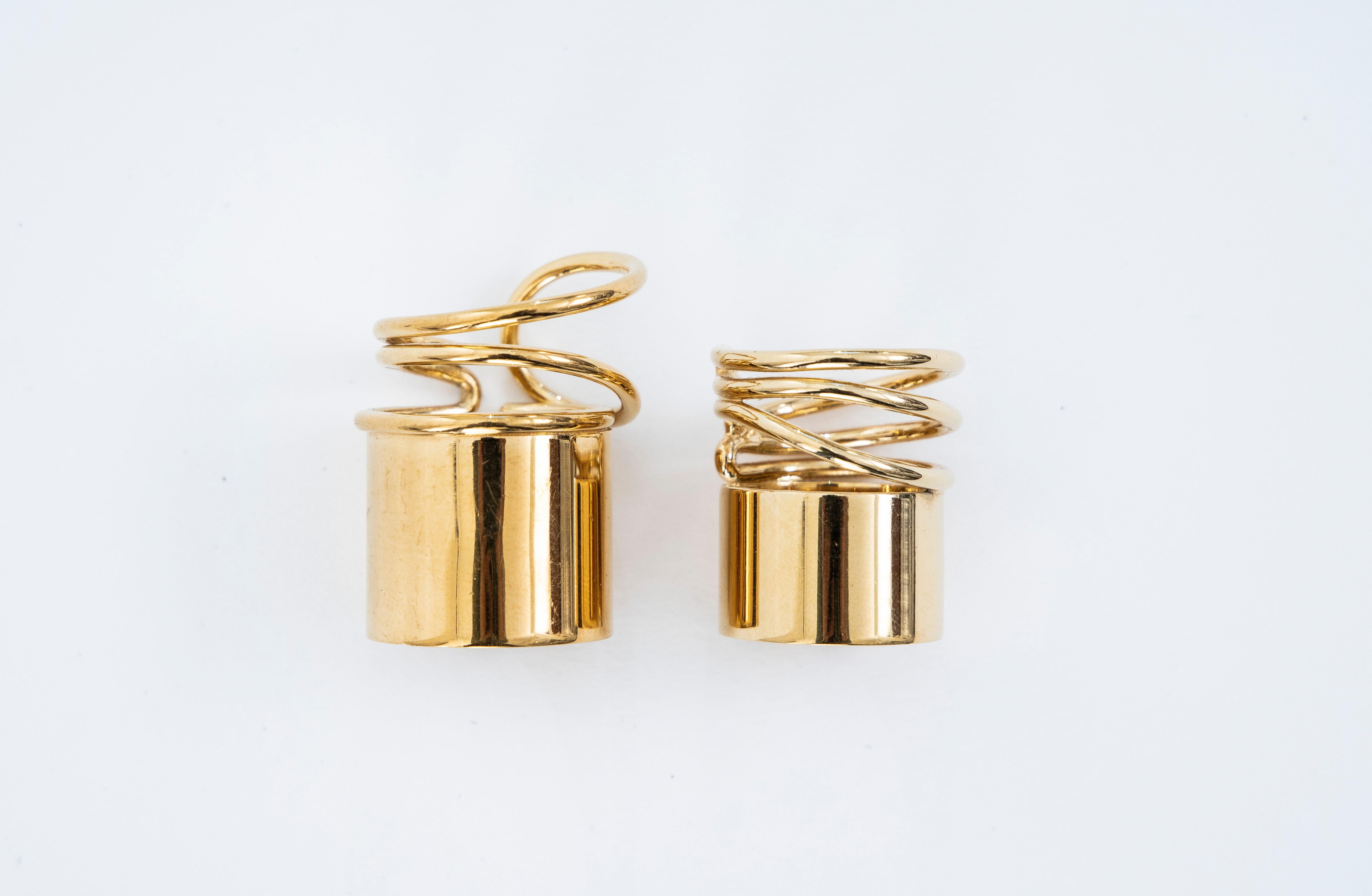 Nicolas Ghesquière for Balenciaga, Runway Spring-Summer 2013 a pair of gold tone brass coil rings designed by Charlotte Chesnais. 

Size: 6.5
Size: 8