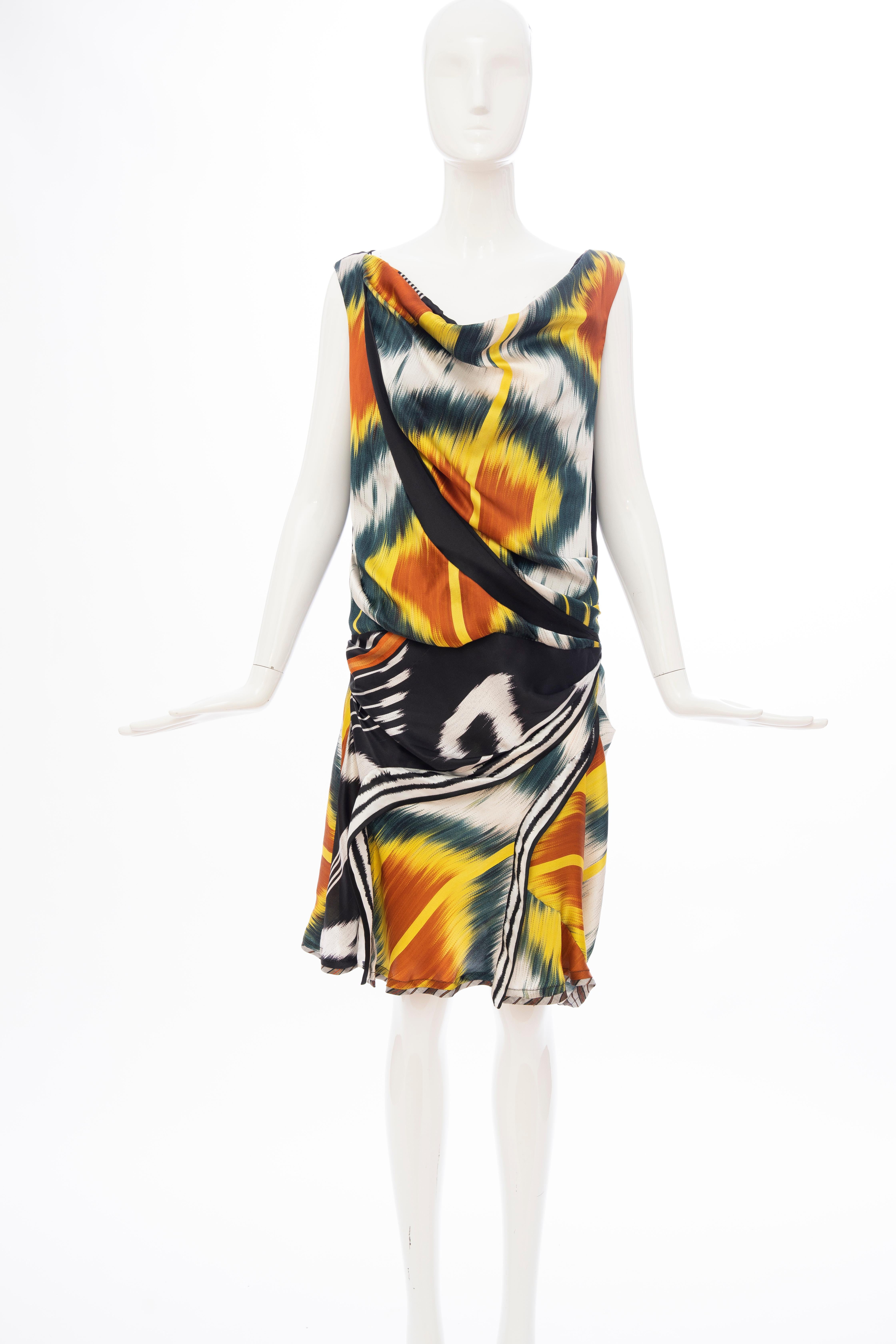 Nicolas Ghesquière for Balenciaga Runway (Look 20) Fall 2007,  sleeveless silk ikat dress with concealed side zip closure.

FR. 40, US. 4

Bust: 34