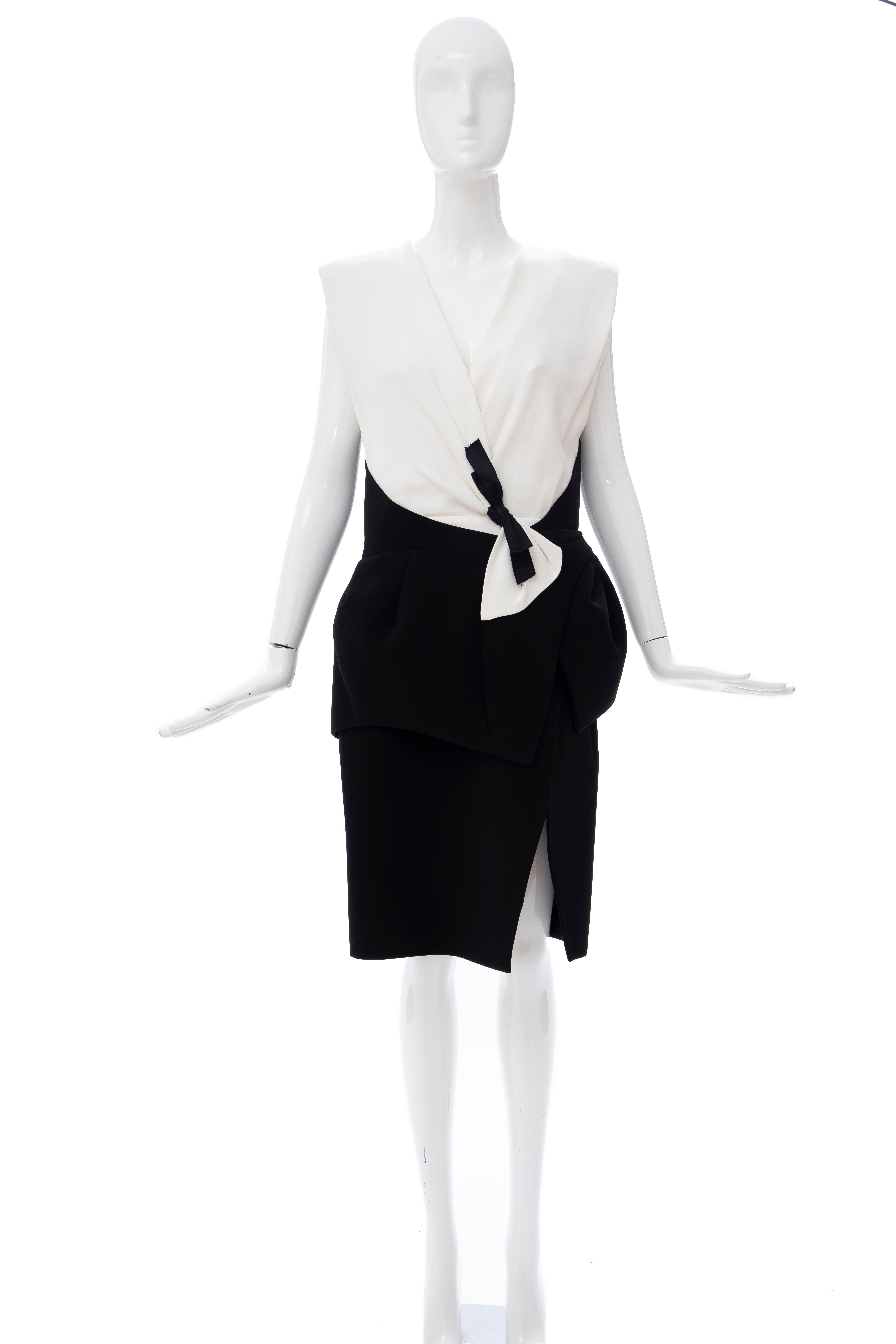 Nicolas Ghesquière for Balenciaga Runway Fall 2008 black and white color block dress with structured shoulders, bow accent at waist, concealed zip closure at back and built-in bra.

FR. 42, US. 10

Bust: 32, Waist: 31, Hip: 36, Length: 40

Fabric: